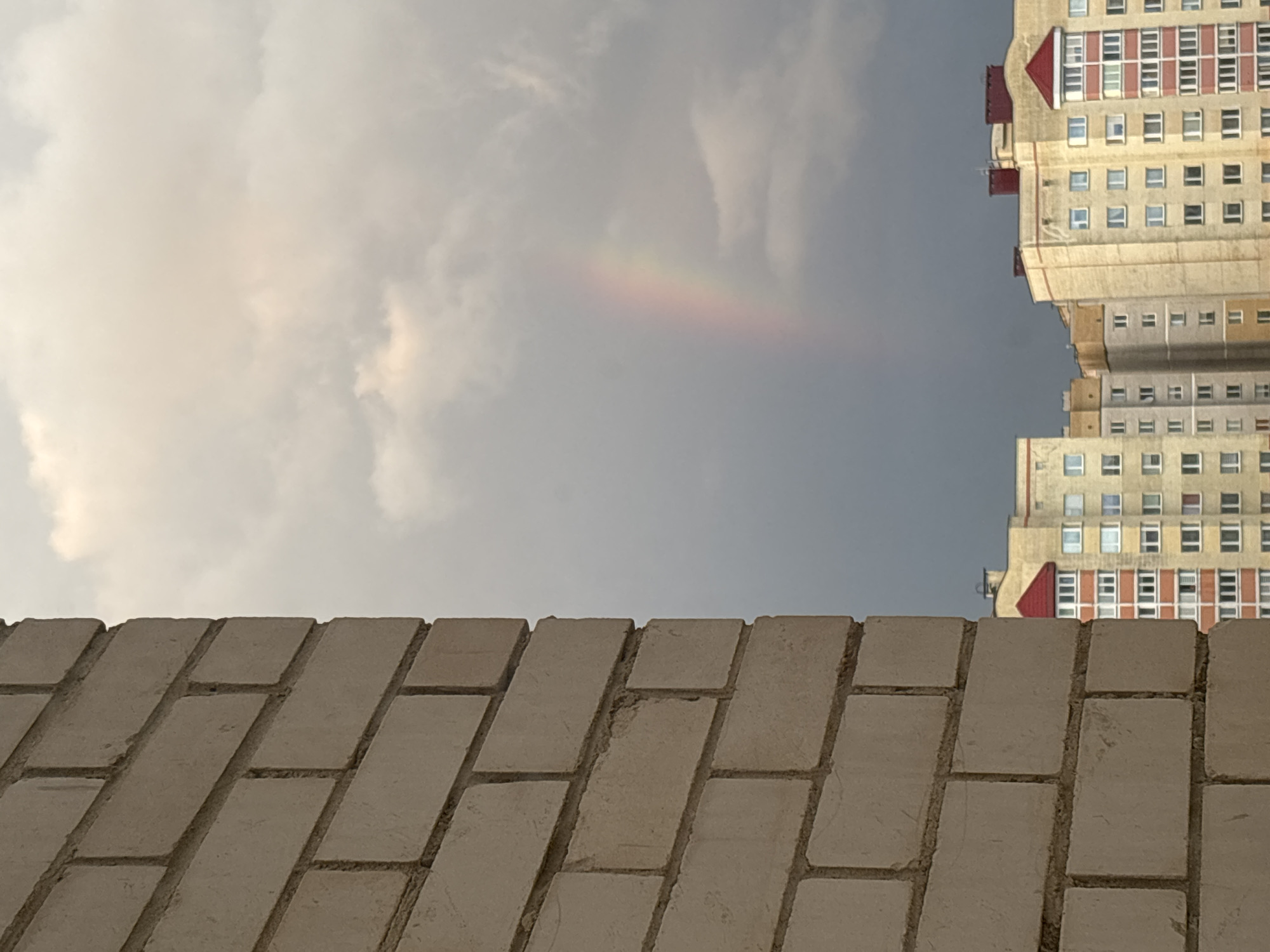 Faint rainbow spotted over Baranavichy, Belarus amid cloudy skies