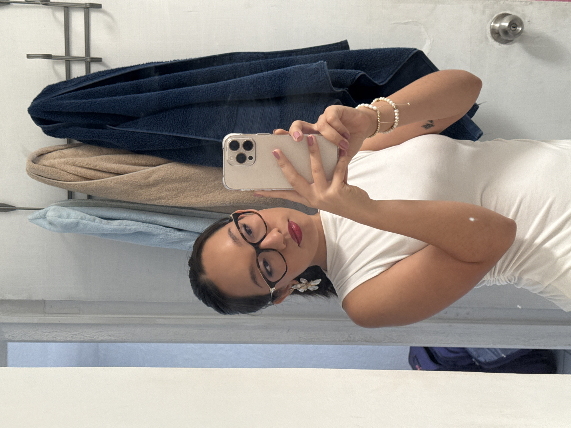 Woman takes bathroom selfie in Puebla, Mexico