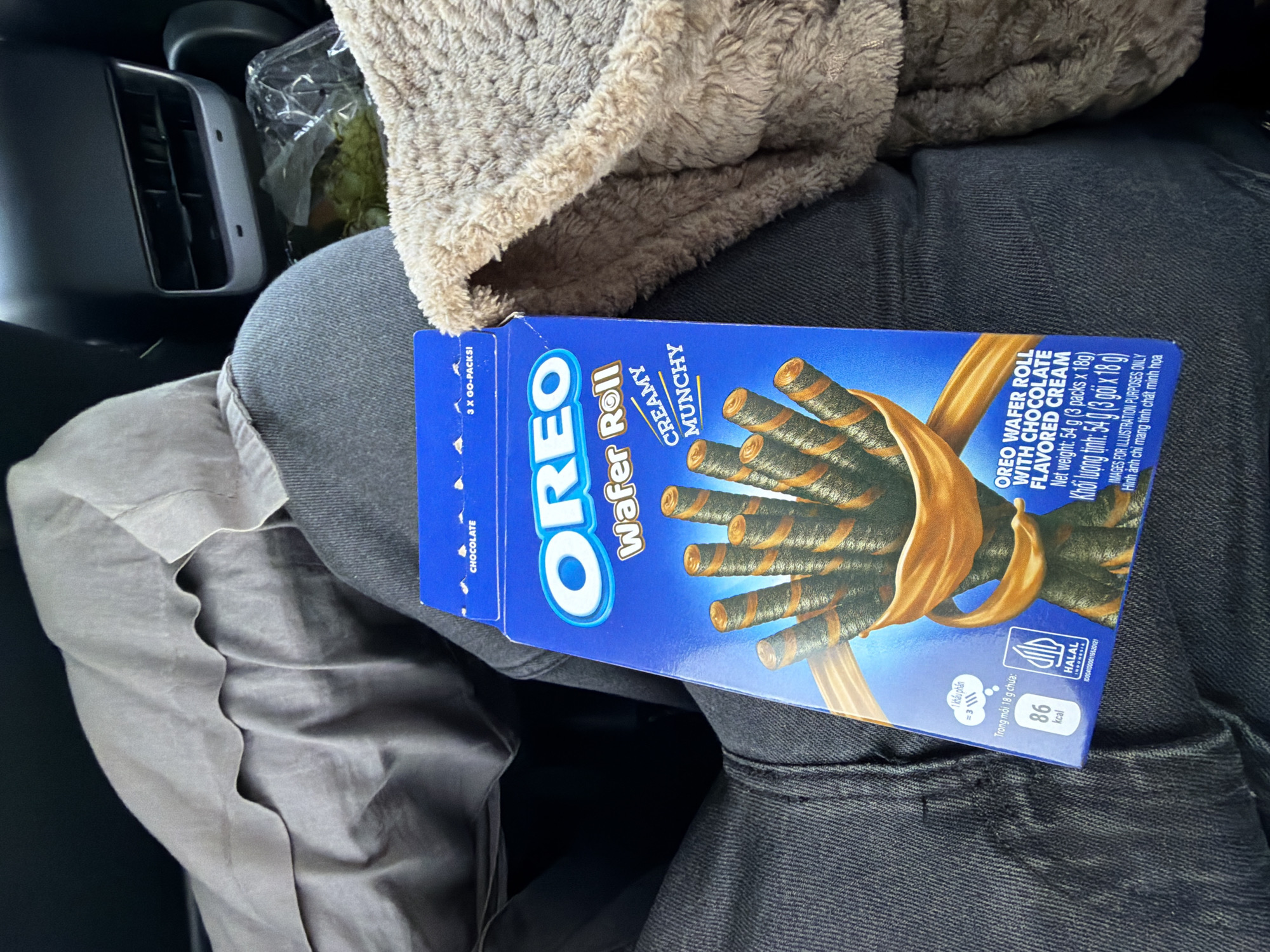 Oreo snacks and drinks spread across a Gothenburg car interior