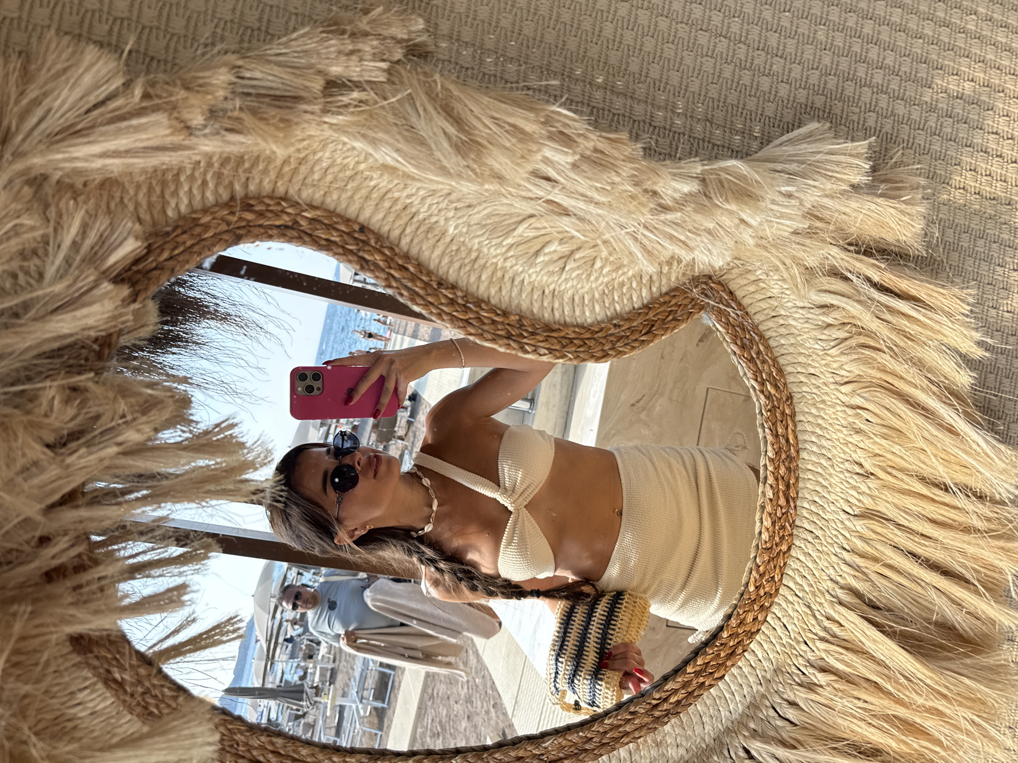 Chill beach day: iced coffee, lounge chairs, and bikini selfies.
