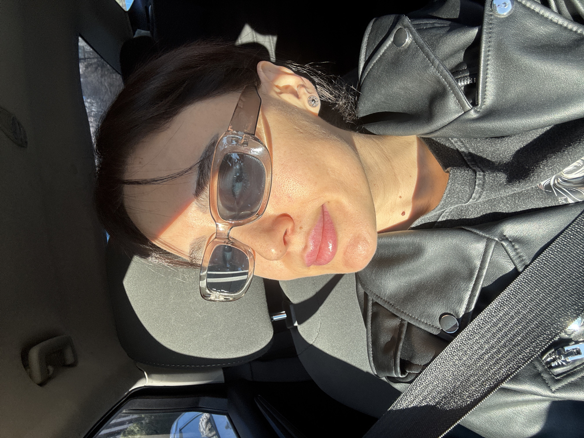 Woman takes car selfies in Tbilisi
