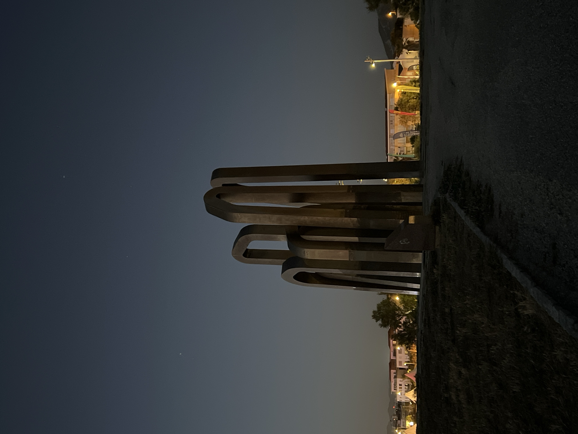 Live beachside show at dusk on Marseille's Prado shore