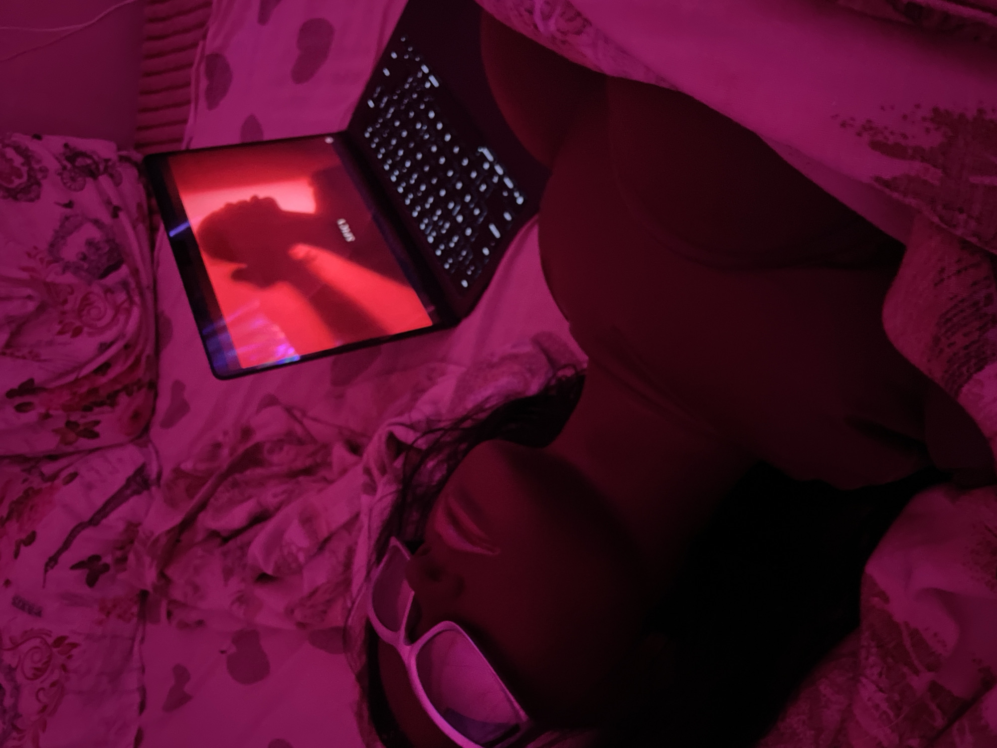 Pink-lit bedroom night with laptop glow and close-up angles