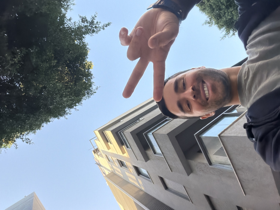 Man takes outdoor selfie in Tel Aviv