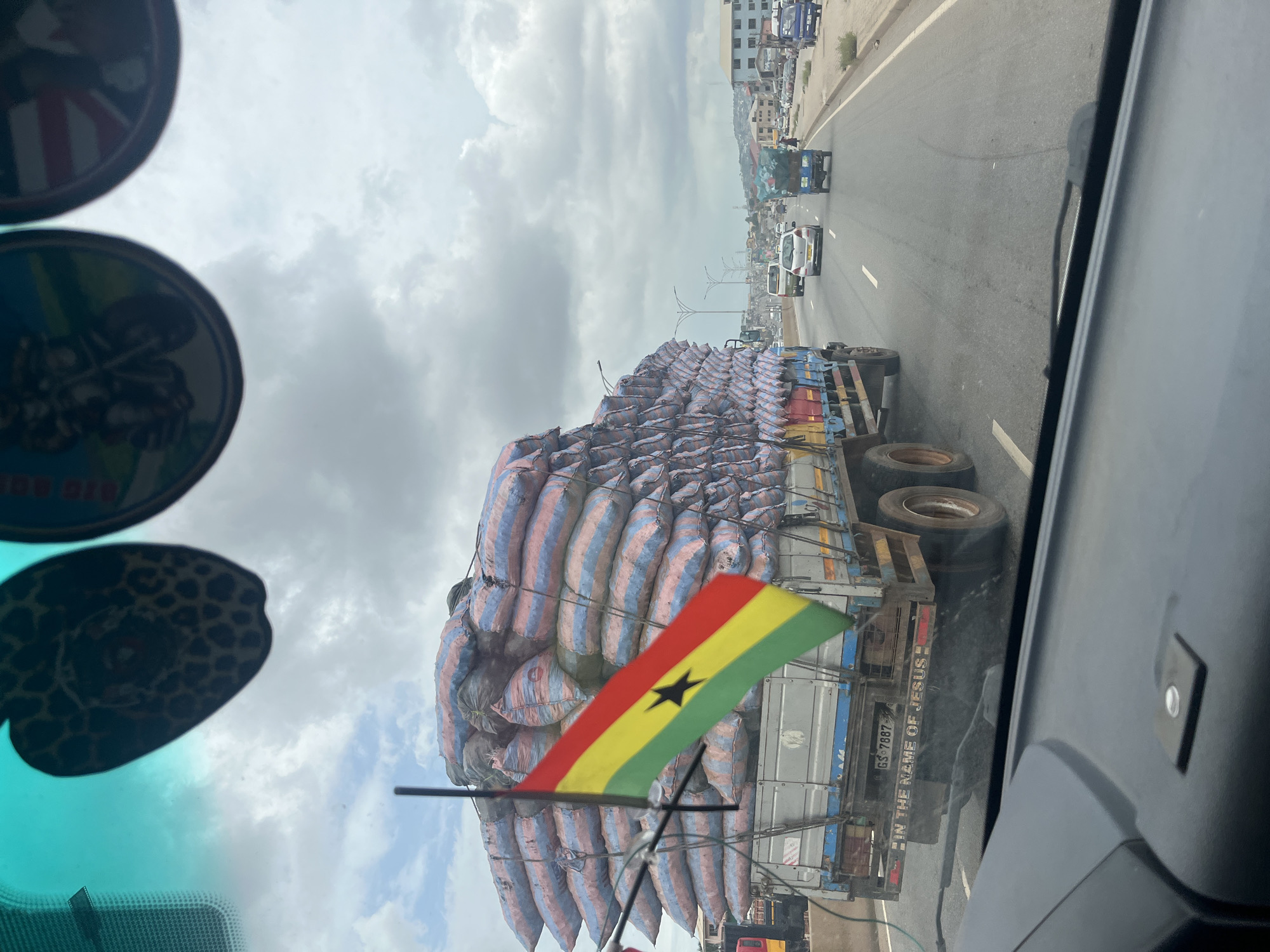 Overloaded truck with Ghanaian flag travels Sowutuom highway