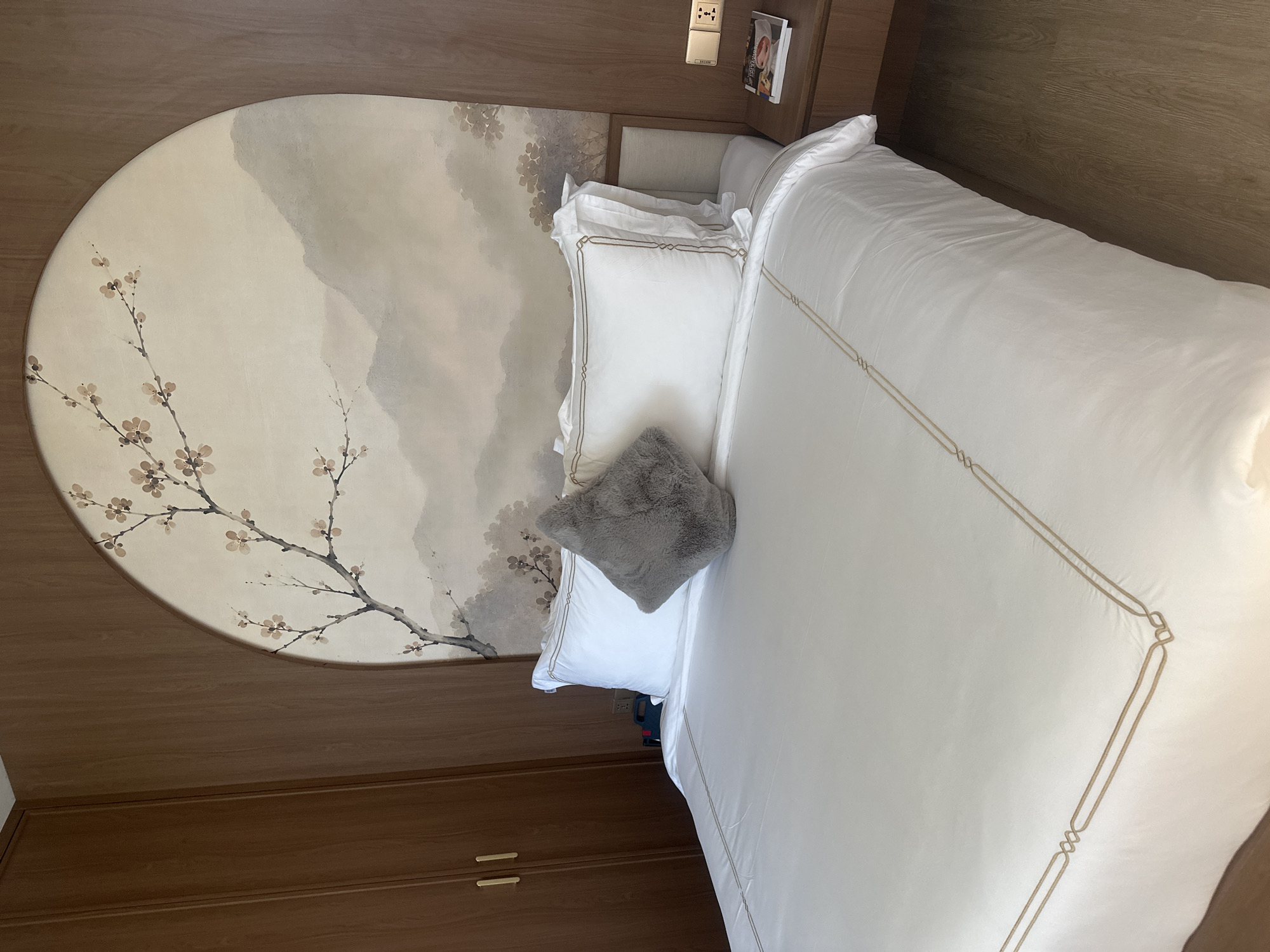 Inside and outside a tidy white-walled accommodation
