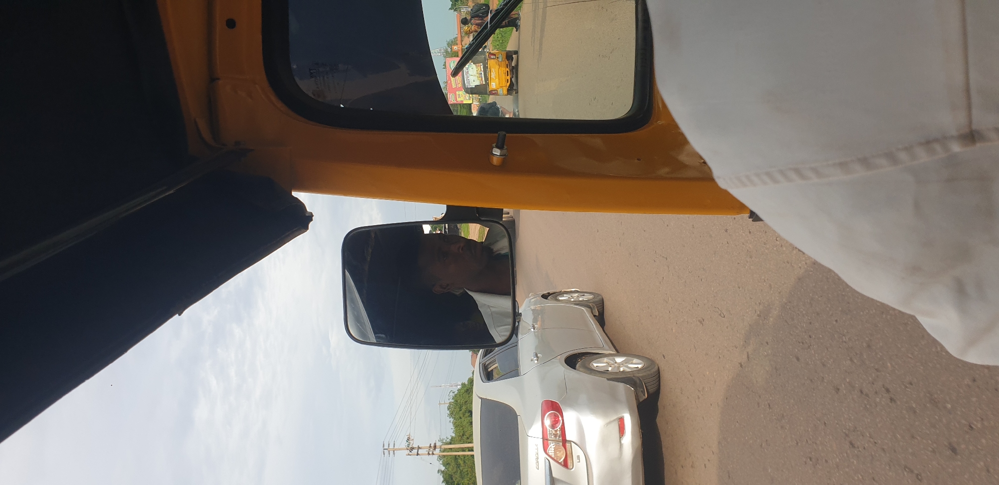 Morning traffic observed from auto-rickshaw in Sabon Tasha, Nigeria