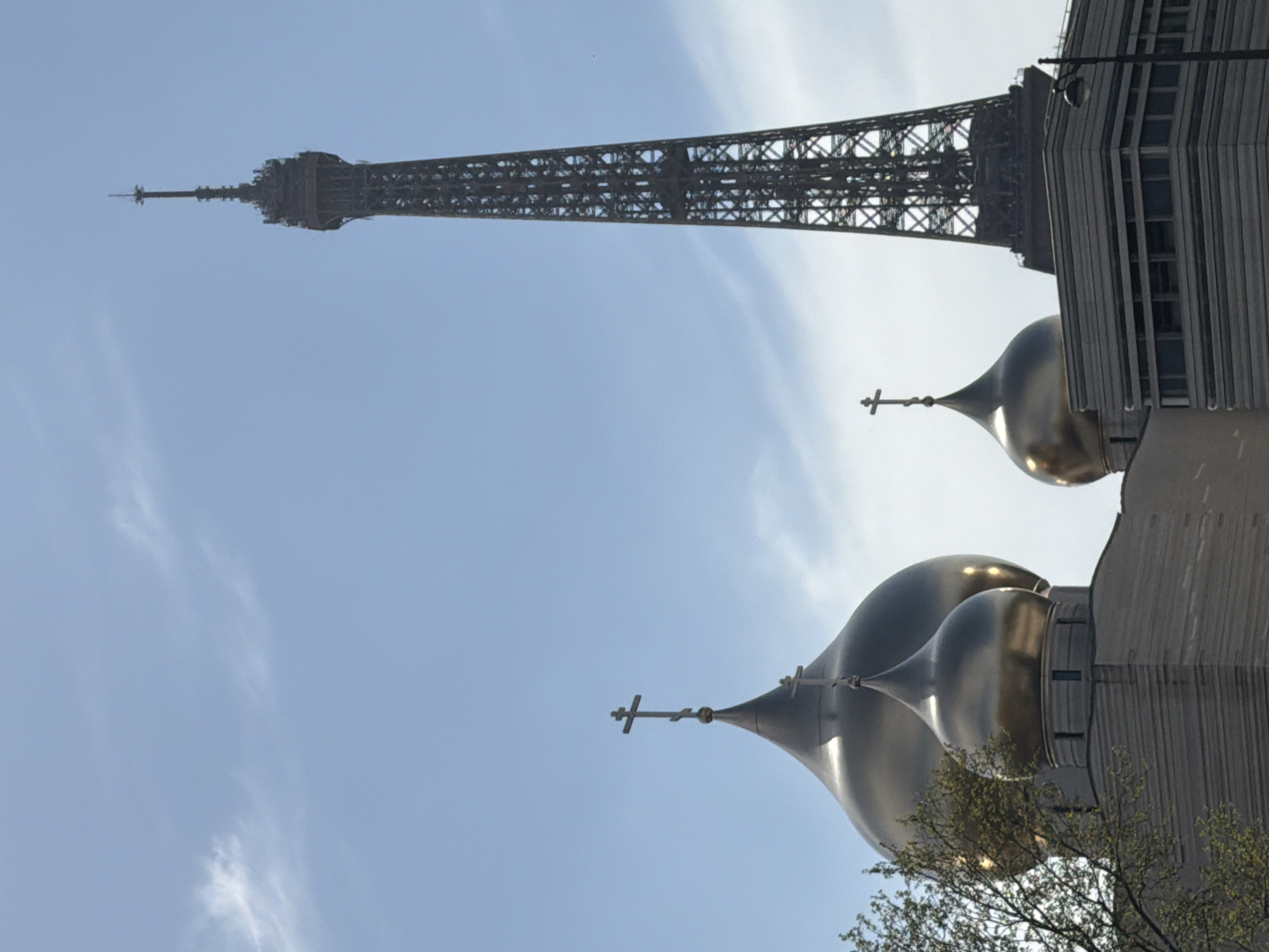 Eiffel Tower viewed with Russian Orthodox Cathedral domes in Paris