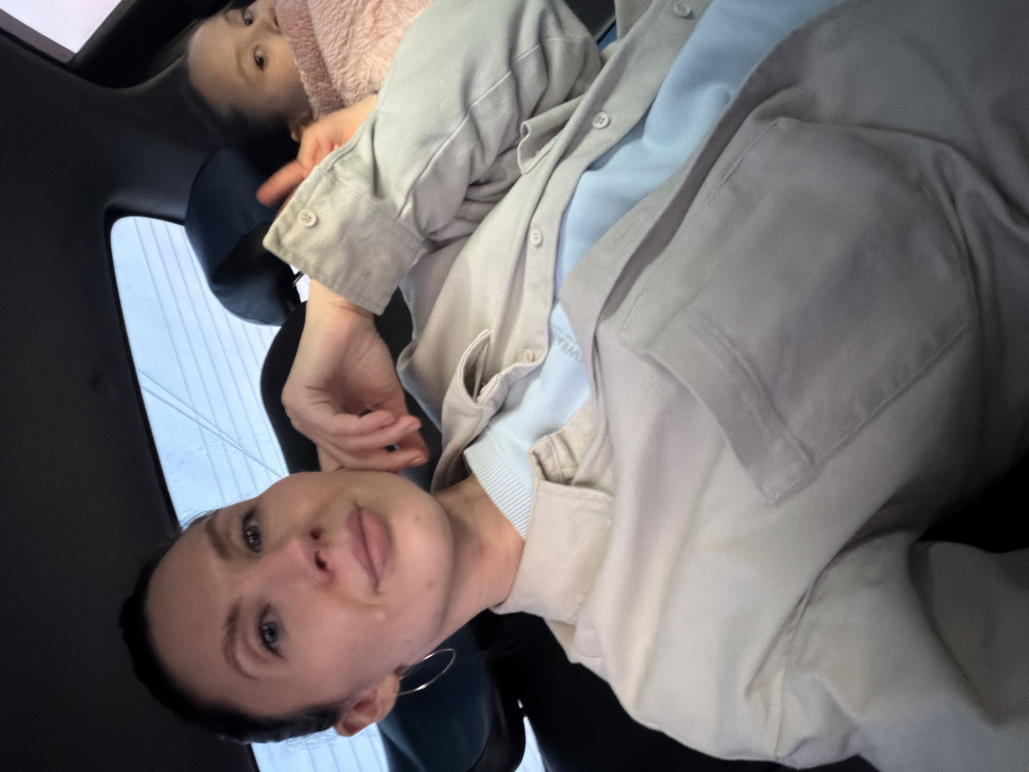 Woman and child spotted in vehicle interior in Perm