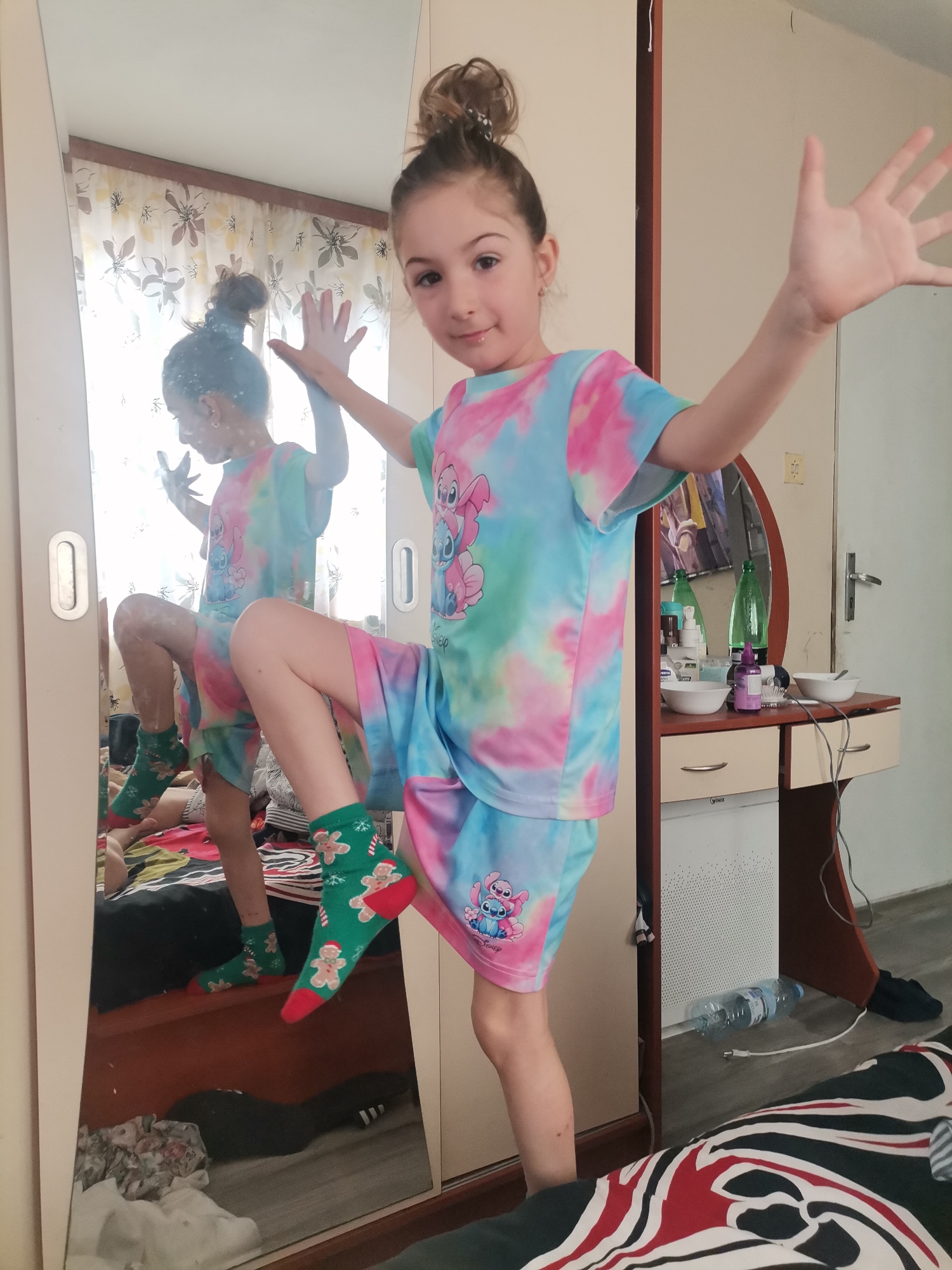 Girl enjoys morning routine in Bulgarian bedroom