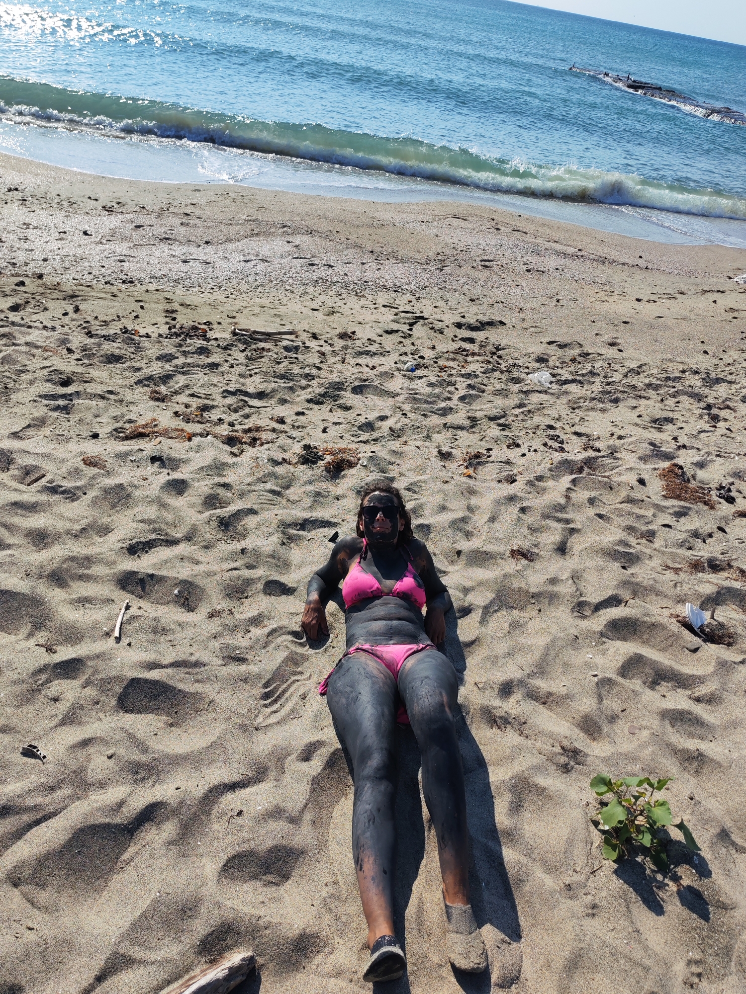 Mud bath day on Pomorie's Black Sea beach