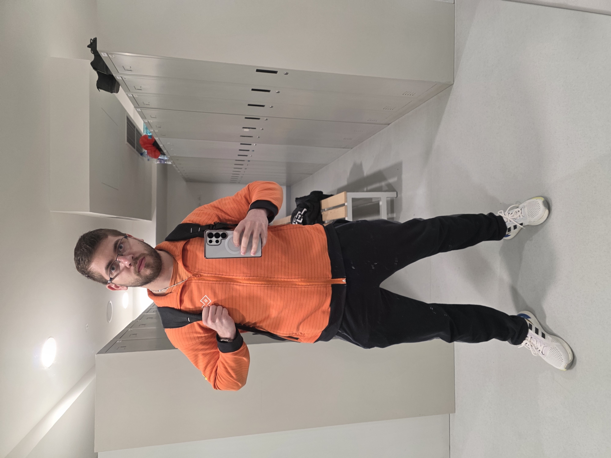 Man in orange BTJ jacket spotted at multiple Plovdiv locations