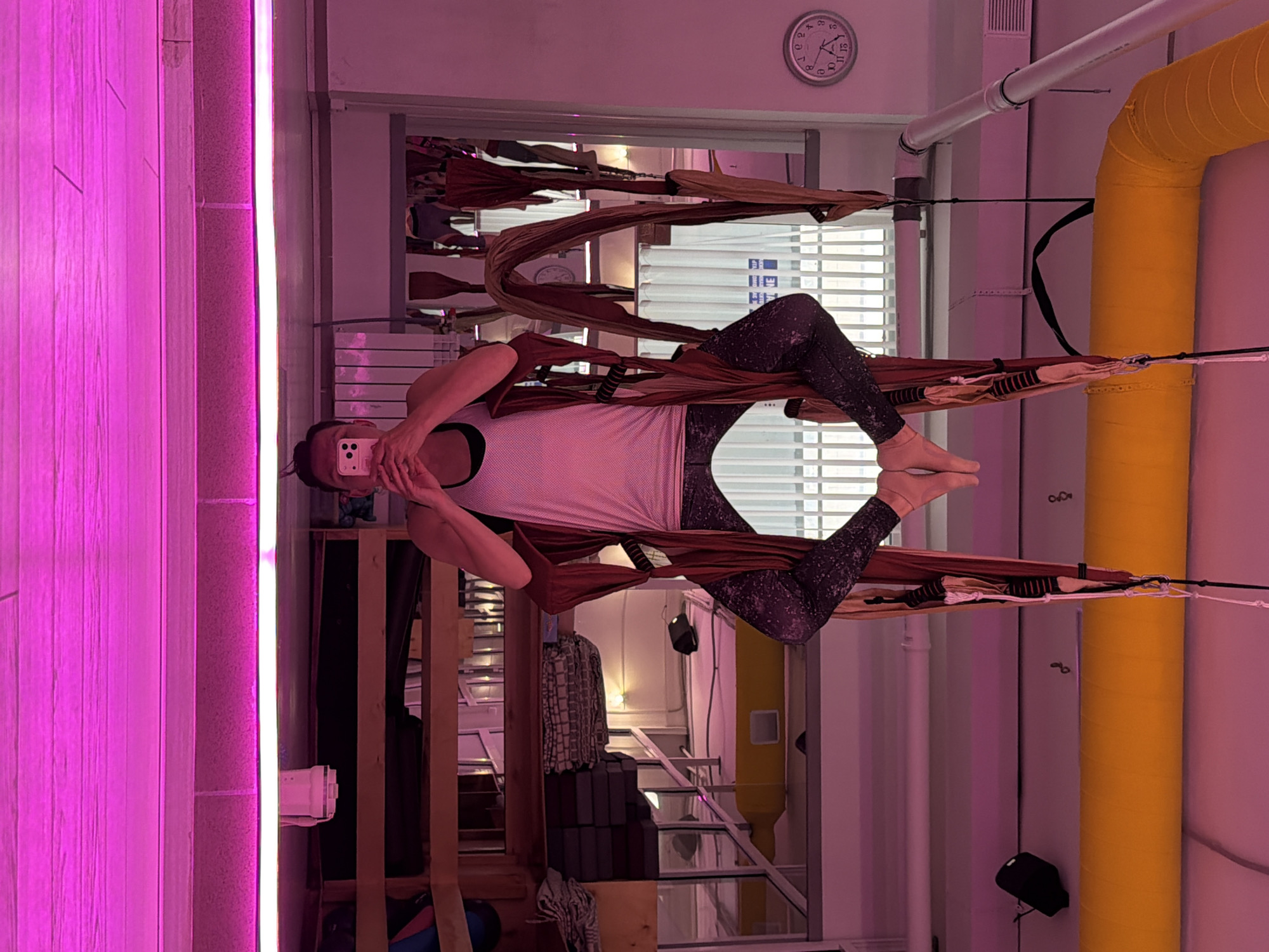 Aerial yoga session underway at a Chaikovsky studio