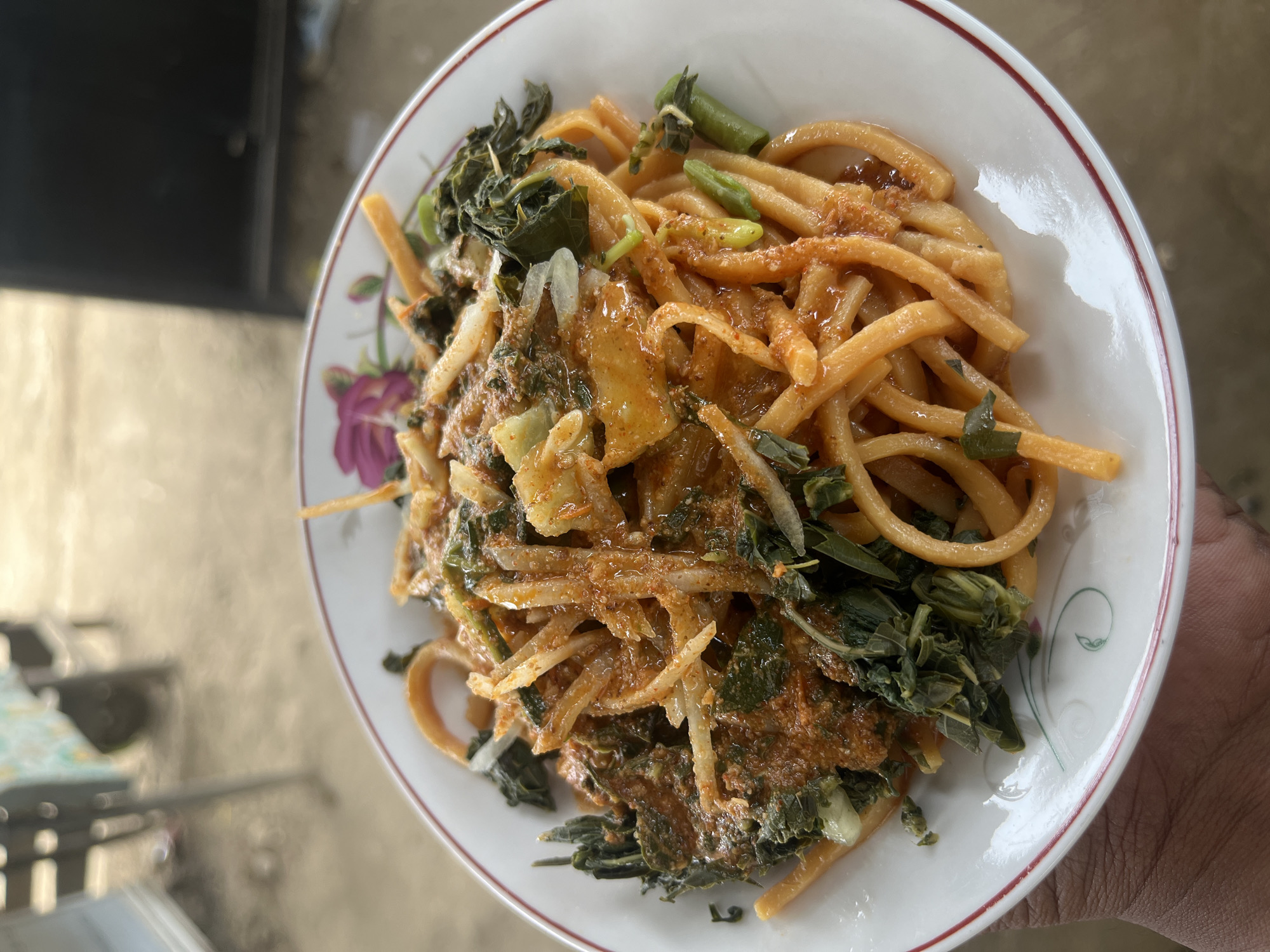 Noodle meal served and eaten outdoors in Geunteng, Indonesia