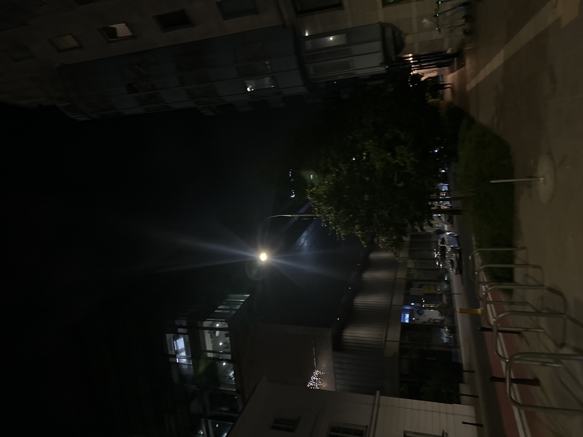Nighttime urban street scene documented by multiple witnesses
