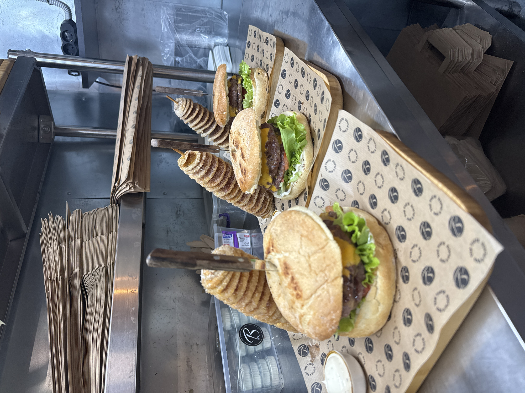 Gourmet burger meal documented at unknown food establishment