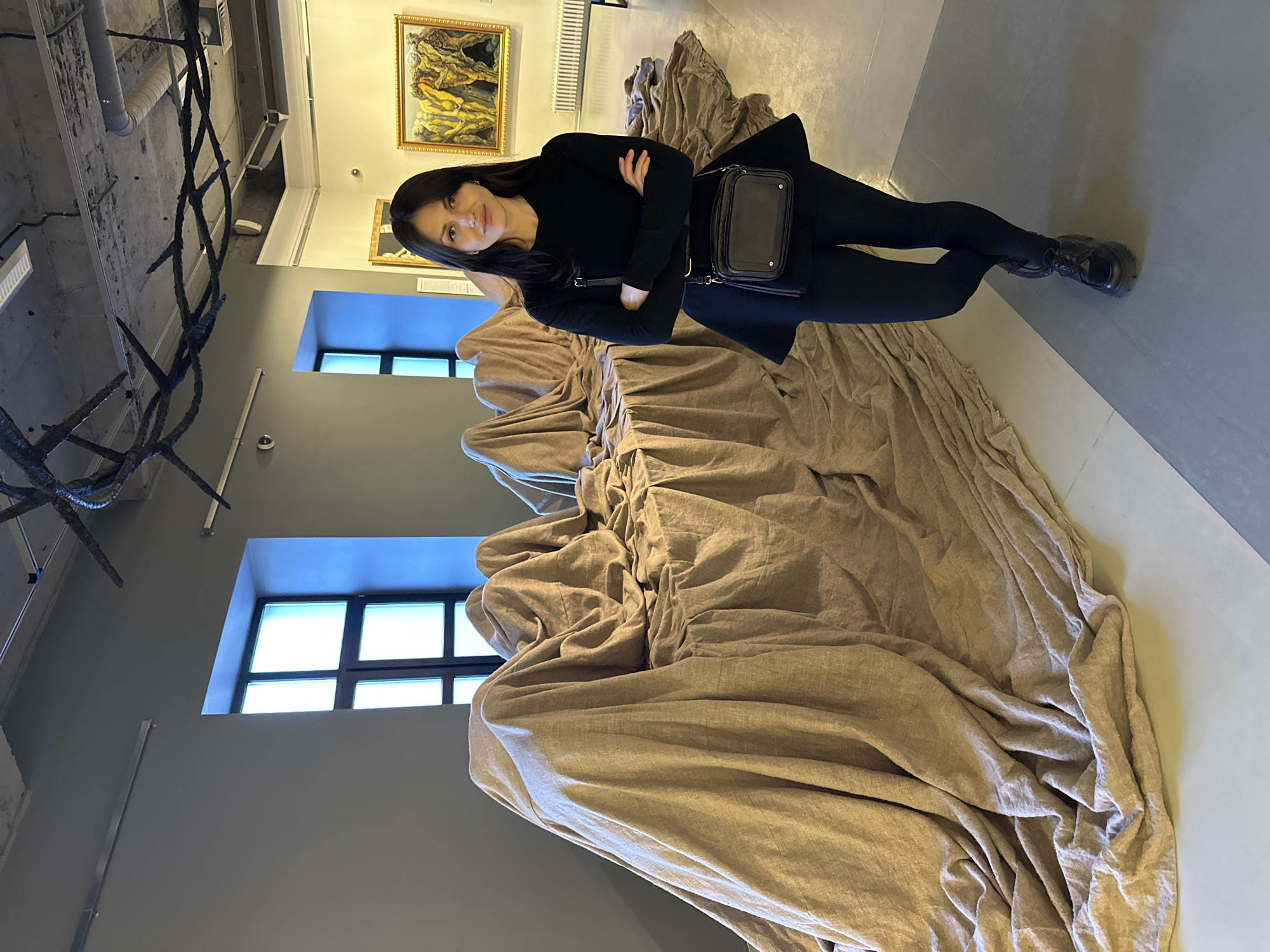 Gallery visitor explores art installations in Saint Petersburg