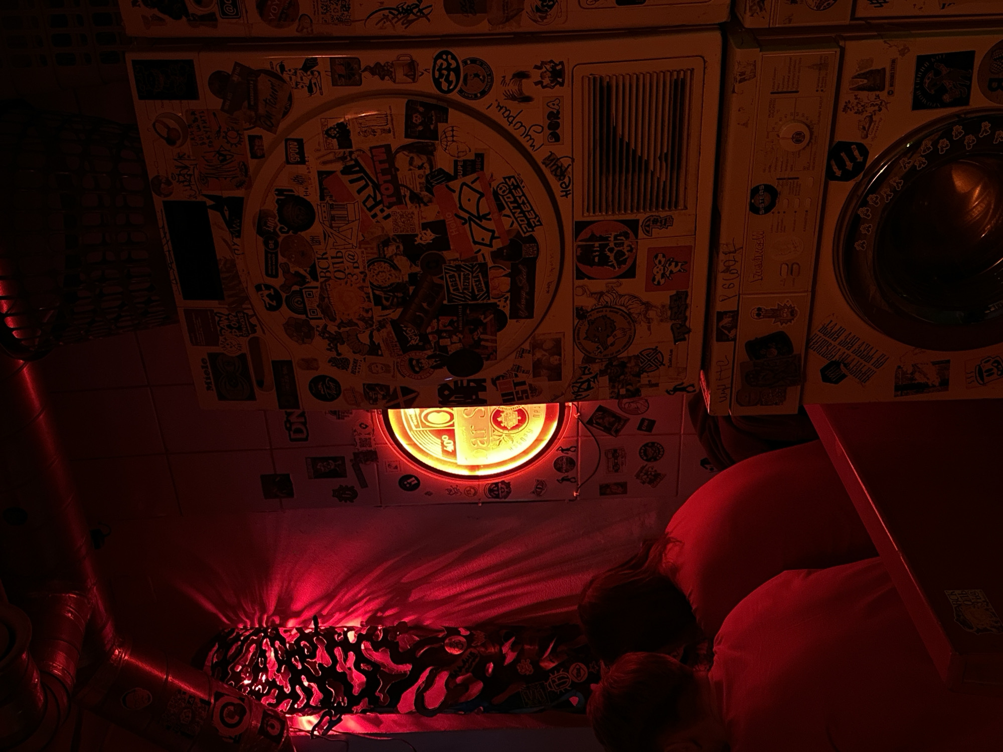 Red-lit bar scene captured in Saint Petersburg evening