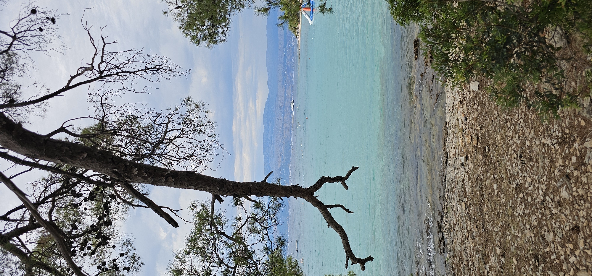 Supetar's Adriatic shoreline, from beach to floating water park