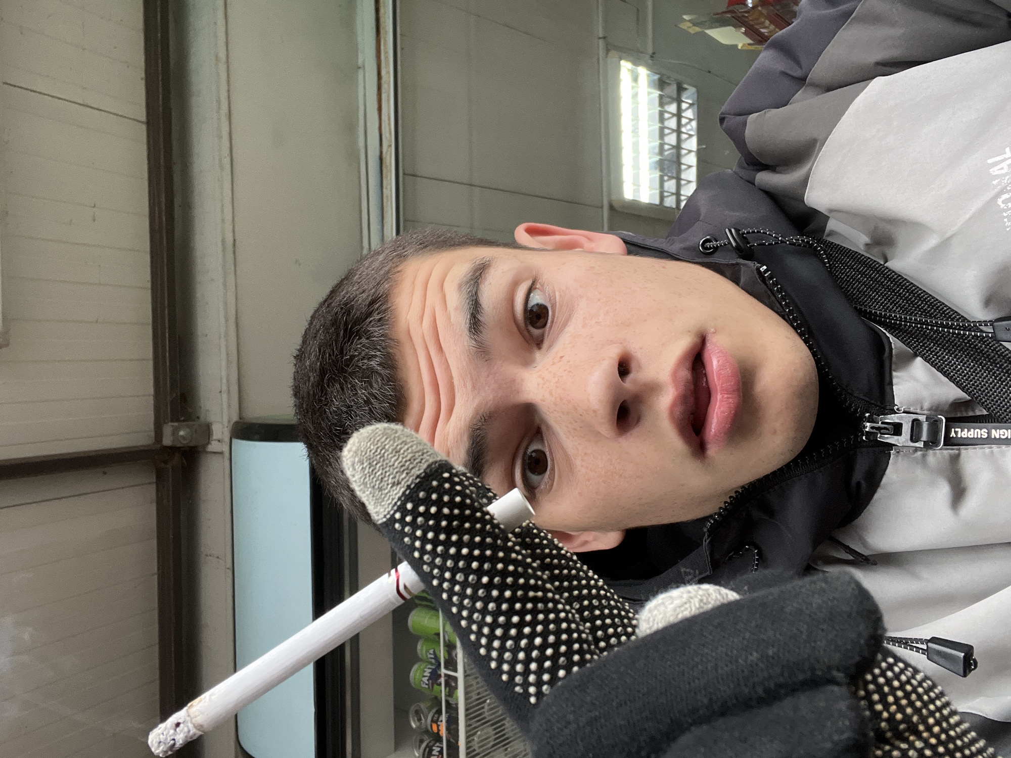 Morning scenes in Sopot: smoking youth, textile cart