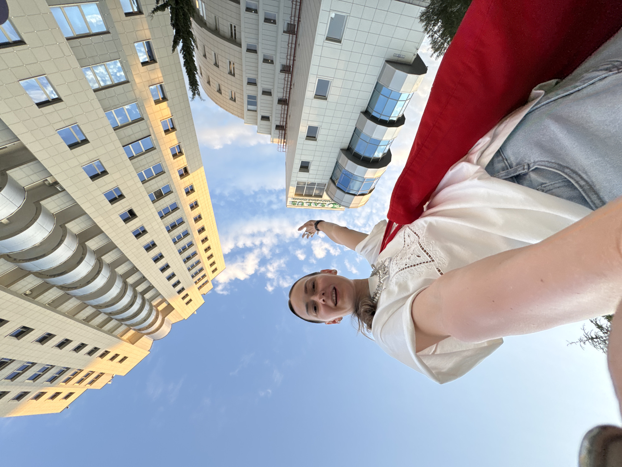 Woman documents casual afternoon exploring Sochi landmarks and recreational spots