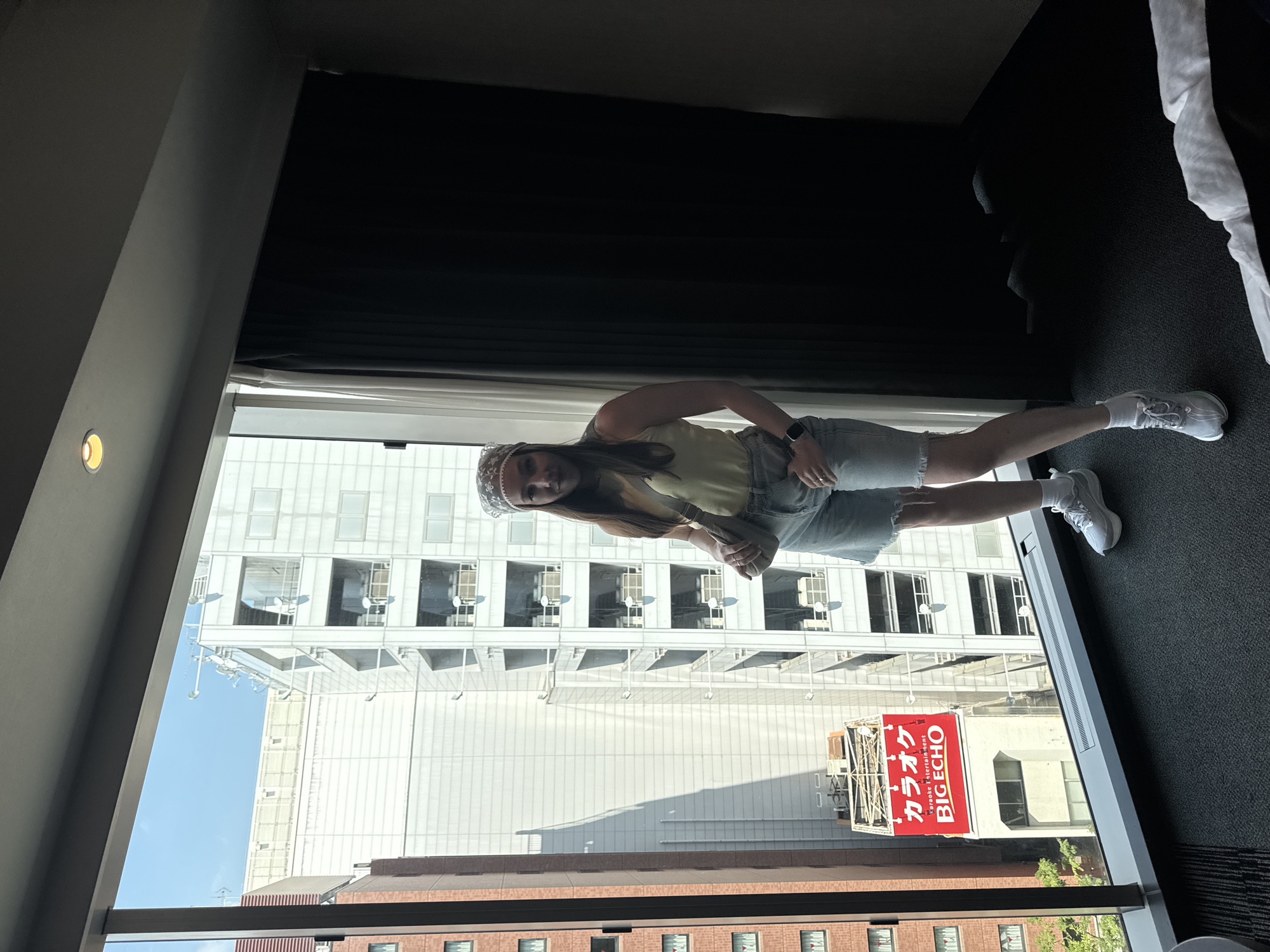 Woman photographs herself in Fukuoka hotel room overnight