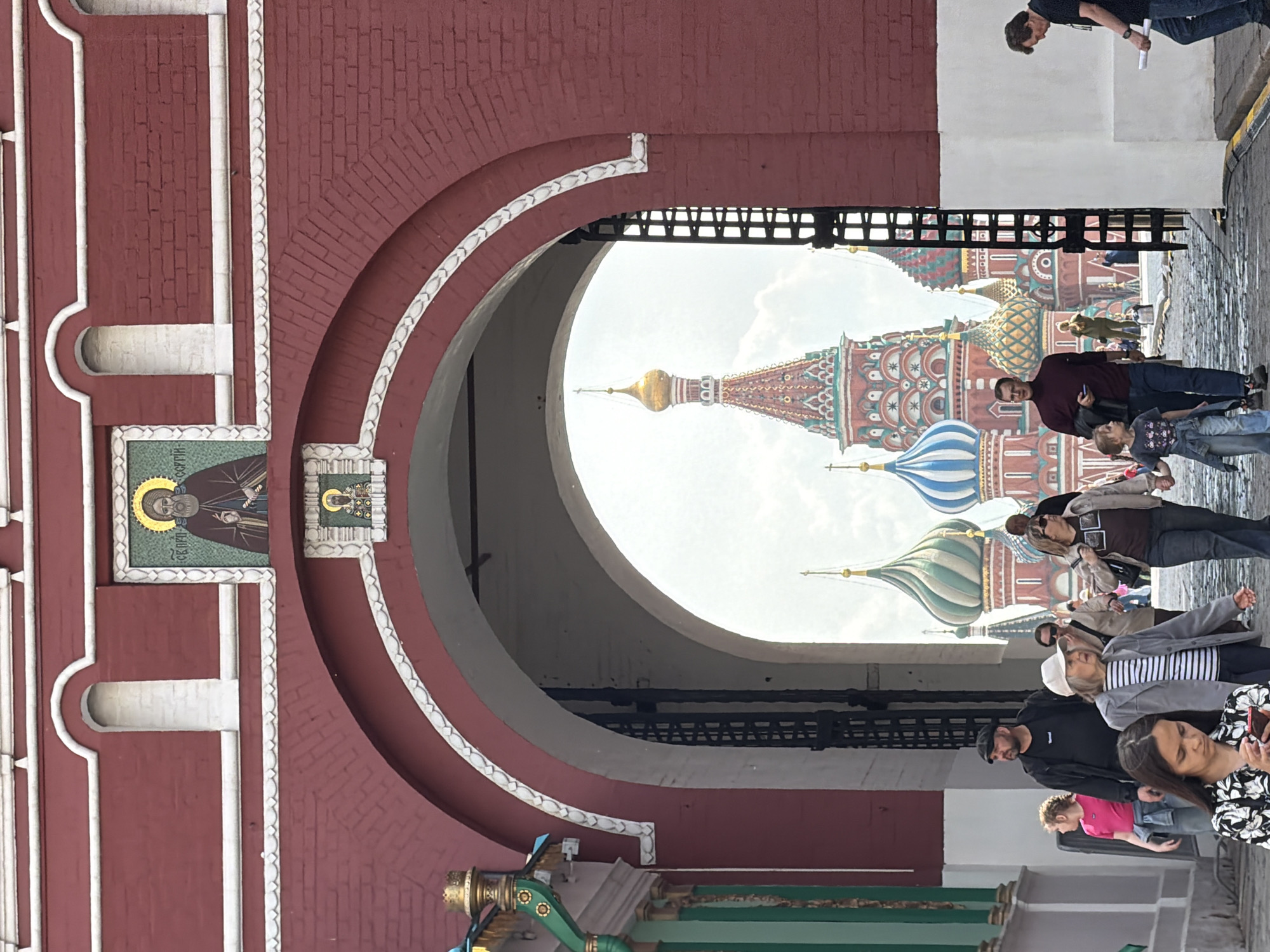St. Basil's Cathedral photographed through ornate archway in Moscow