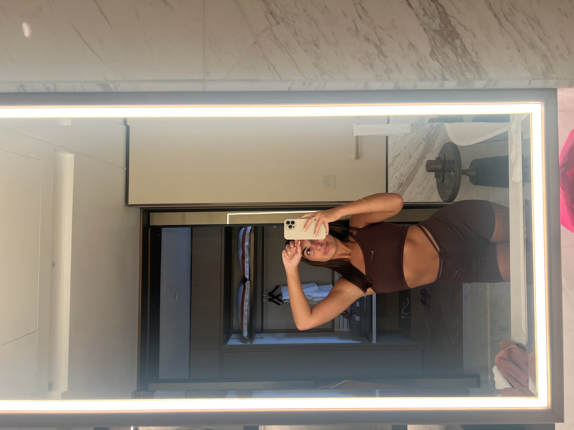 Woman takes morning workout selfies in luxury Dubai bathroom