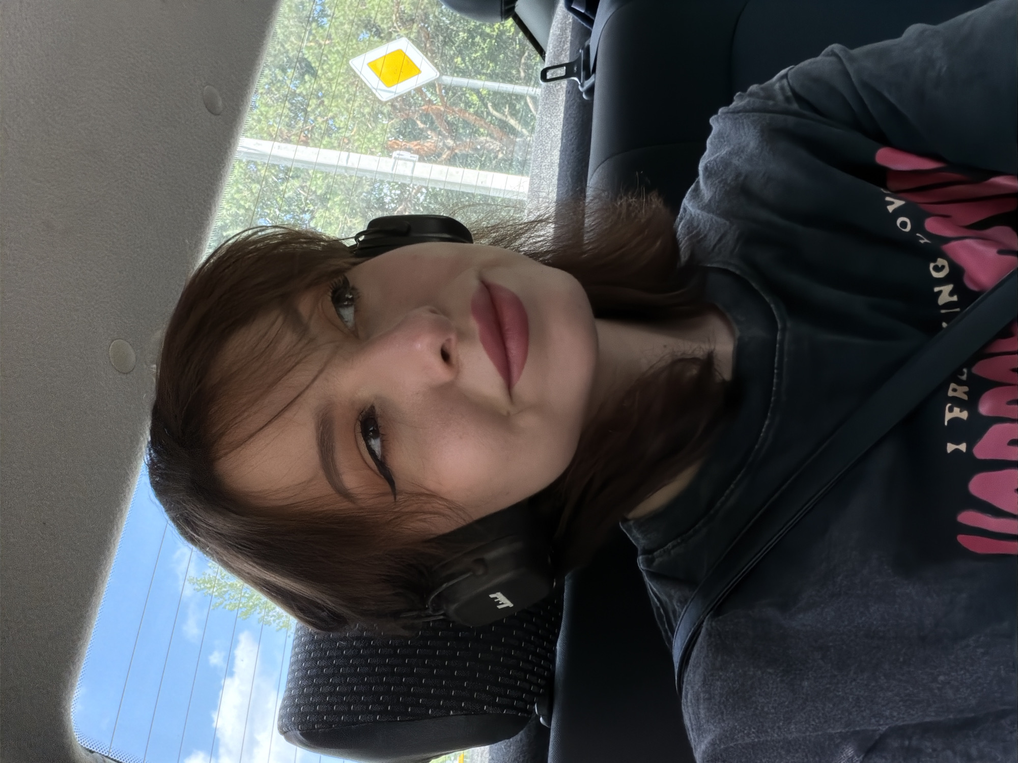 Backseat selfies and accessory close-ups on a casual day