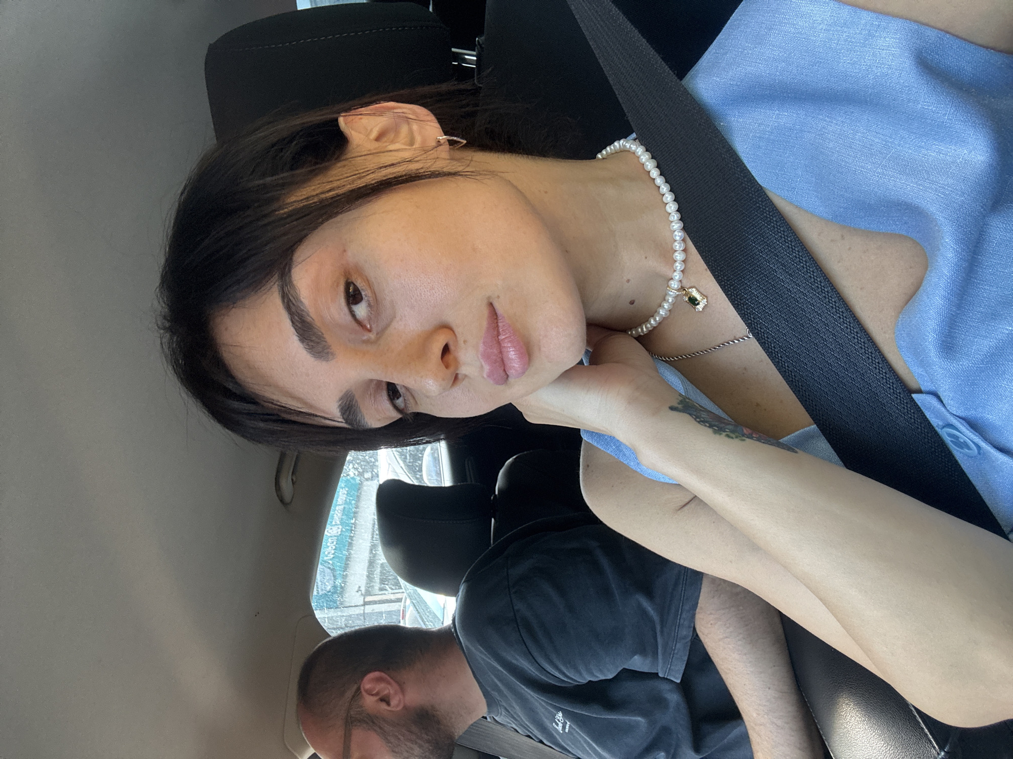 Car ride through midday Tbilisi traffic, selfies and street scenes