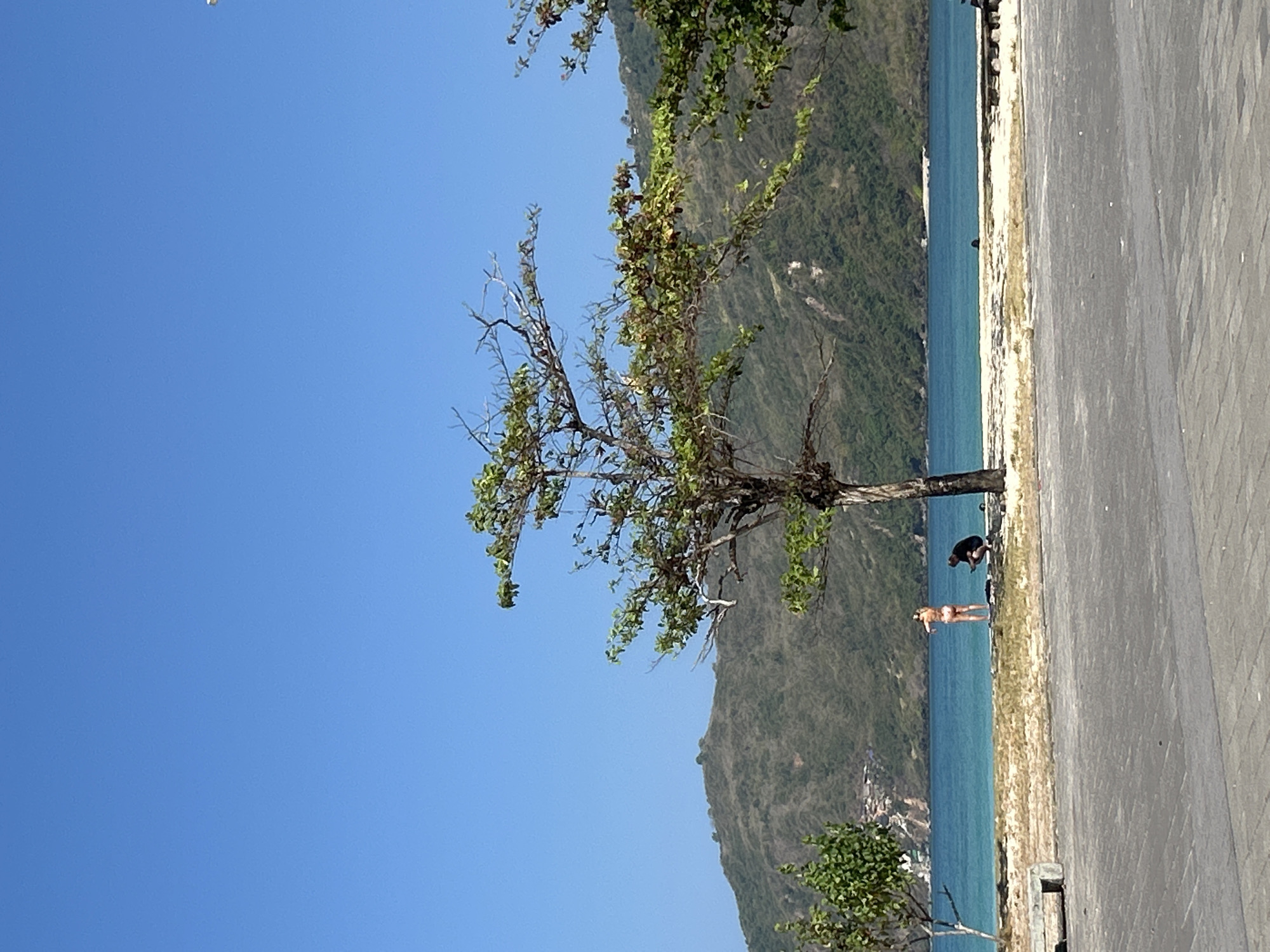 A sunny morning along Kuta Lombok's beach and promenade
