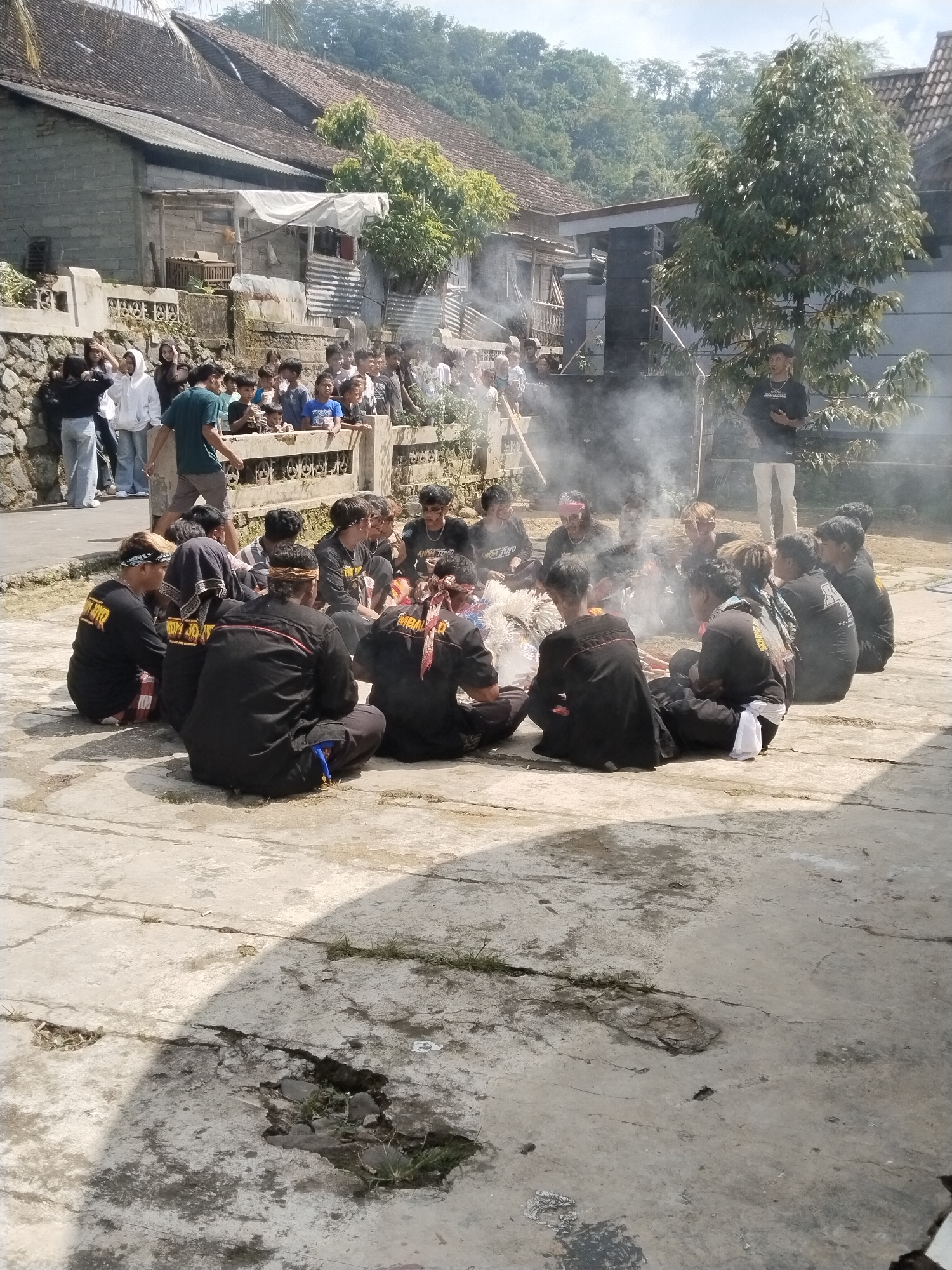 Traditional Indonesian cultural performance draws village gathering