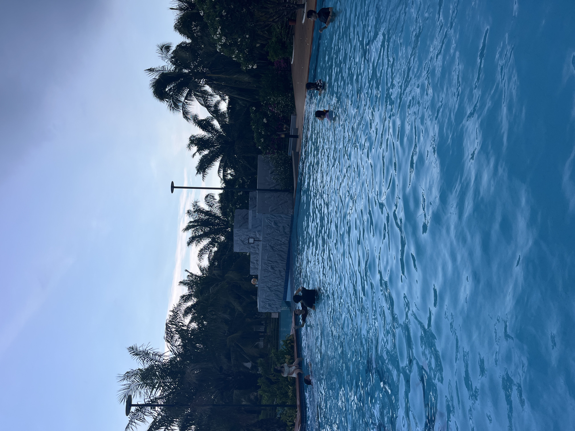 Resort pool day in Vietnam as a storm rolls in