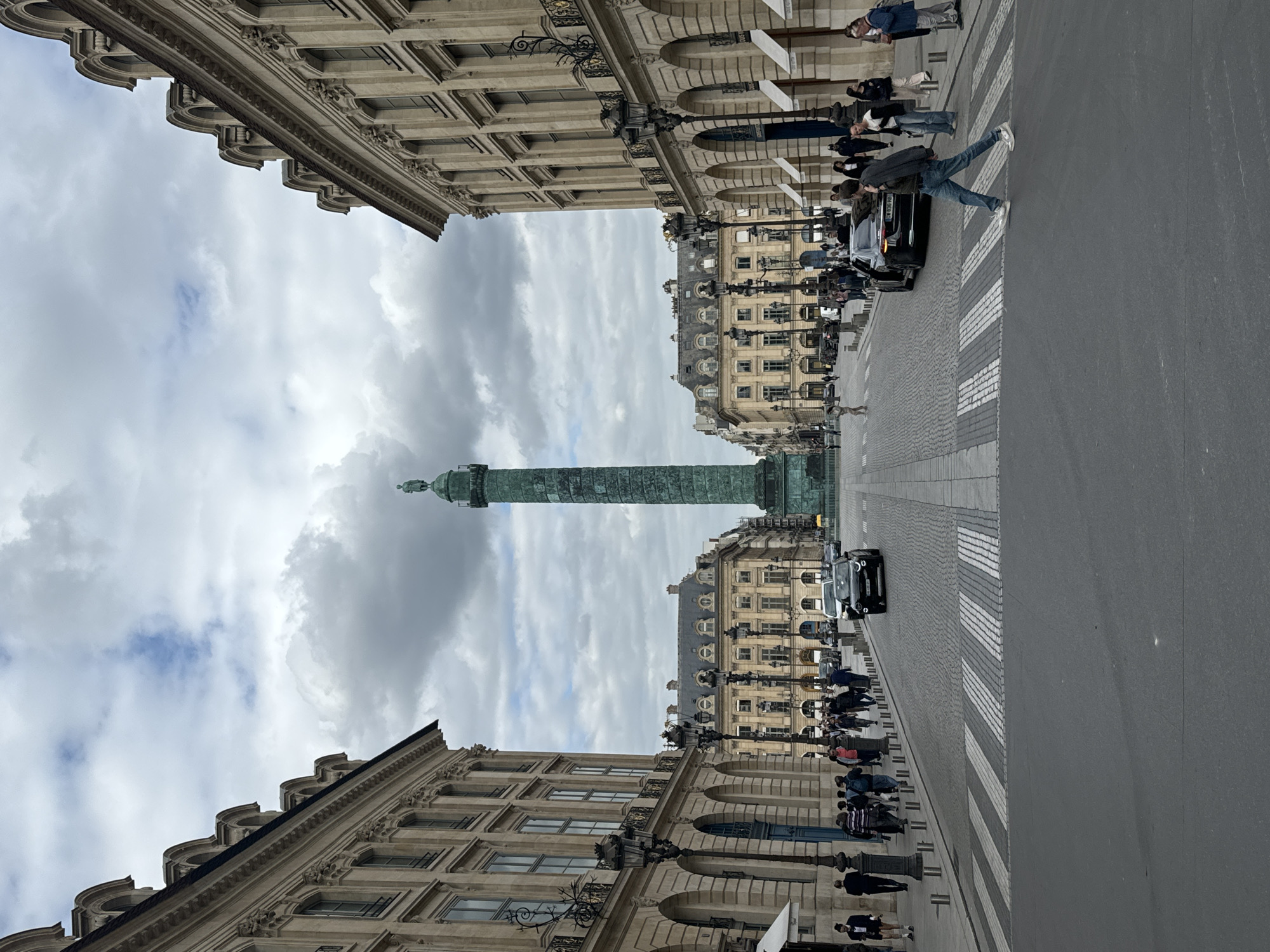 Witnesses document Place Vendôme under cloudy Paris skies