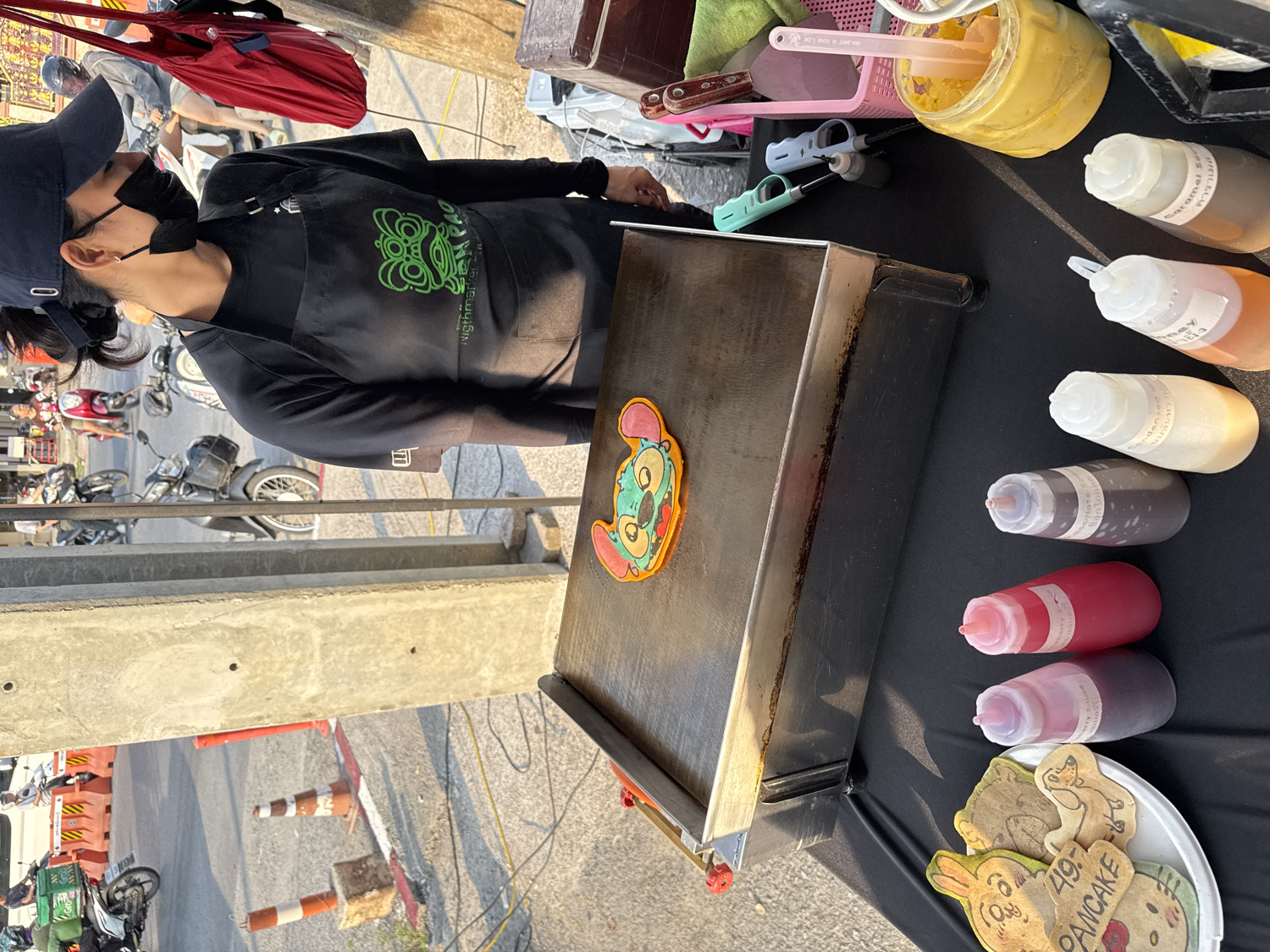 Character pancake vendor operates at Kathu street market