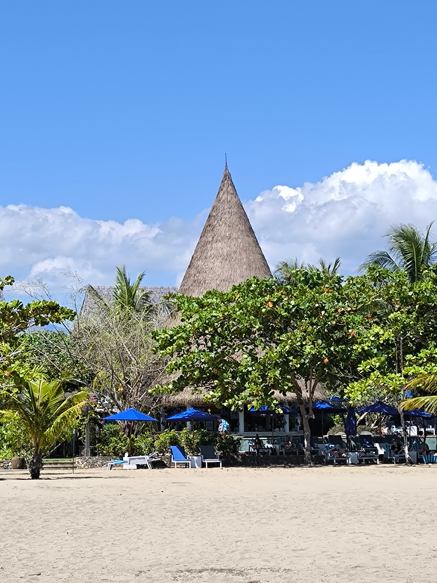 Labuan Bajo coastline: beaches, boats, and tropical resort views