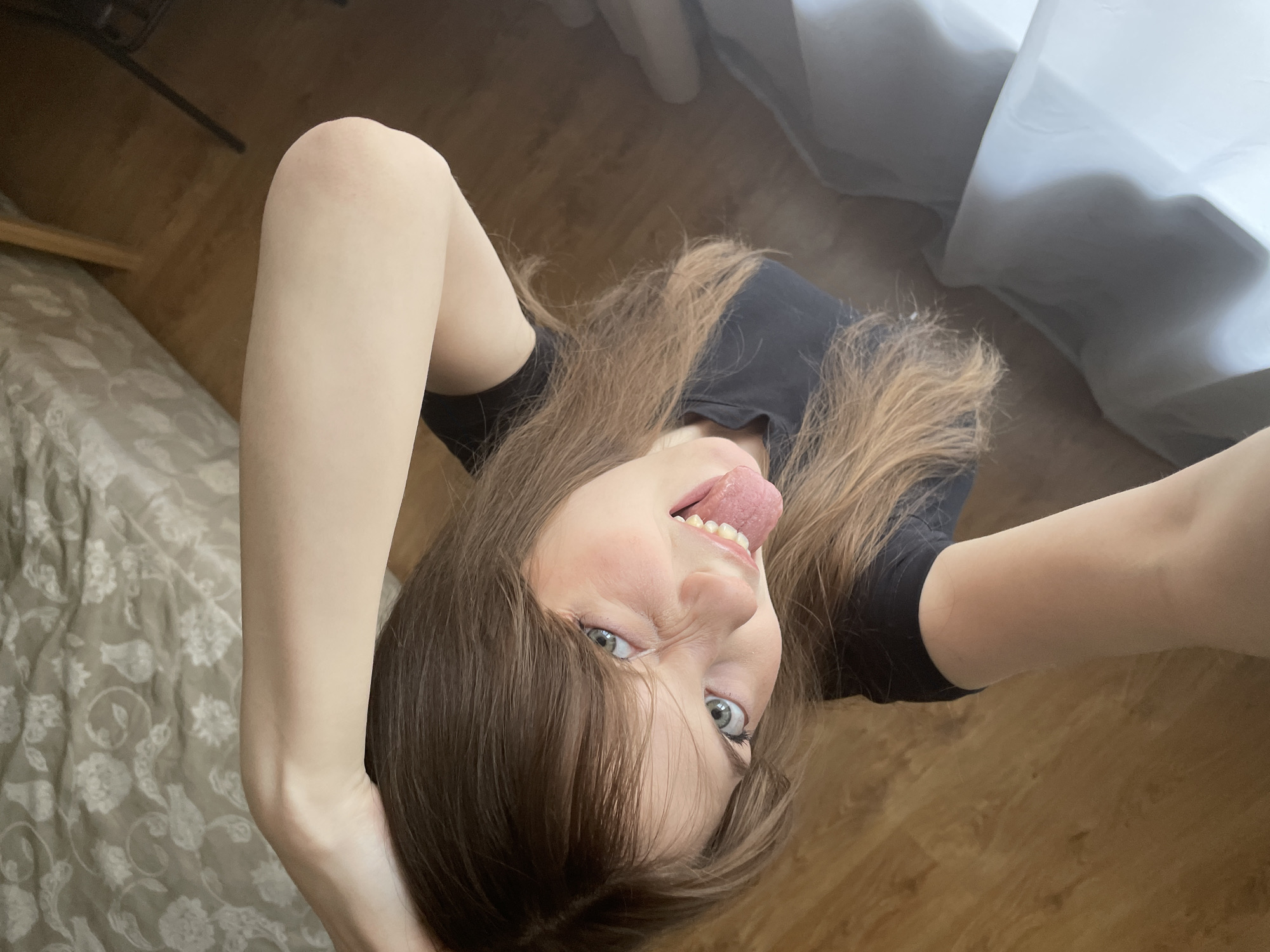 Woman takes selfies indoors in Ufa, Russia