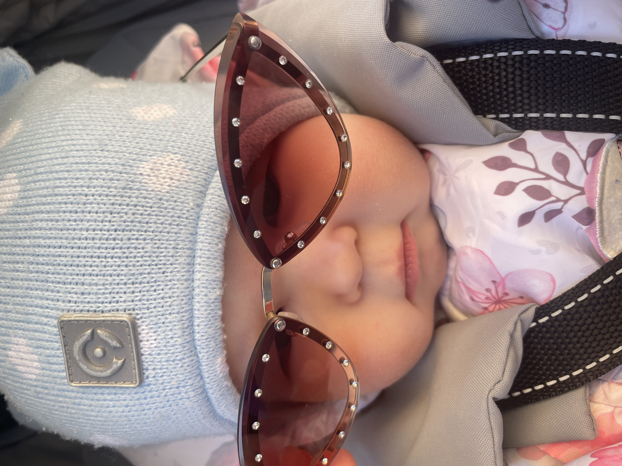 Baby in blue hat spotted in stroller in Chaikovsky