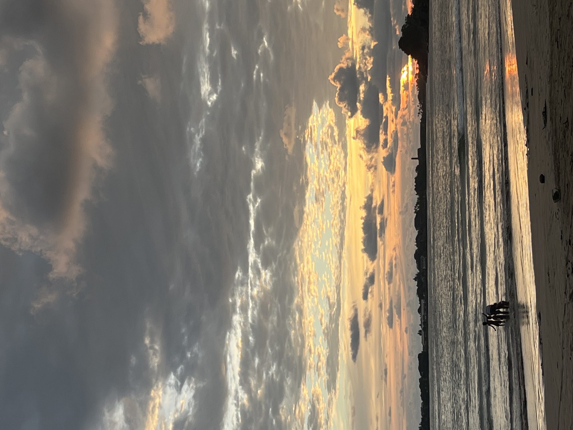 Family enjoys sunset moment on Galle beach