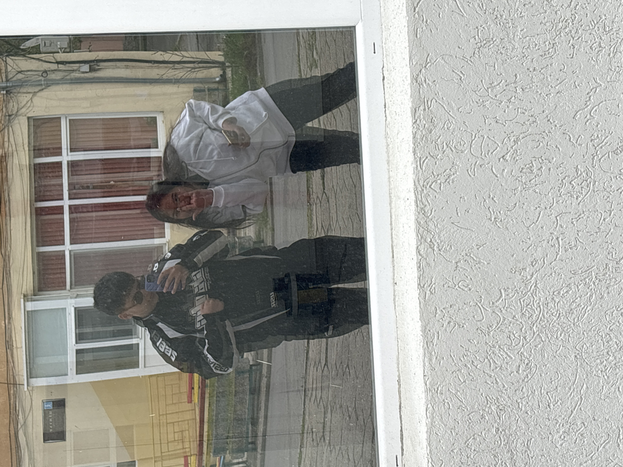 Morning street scenes captured through windows and reflections