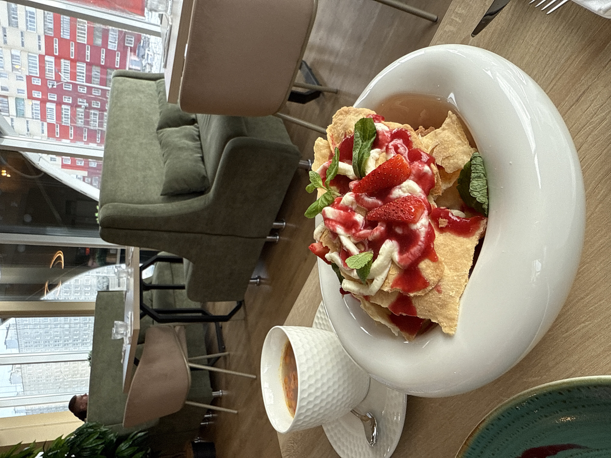 Lunch documented at Nizhnevartovsk restaurant overlooking cityscape