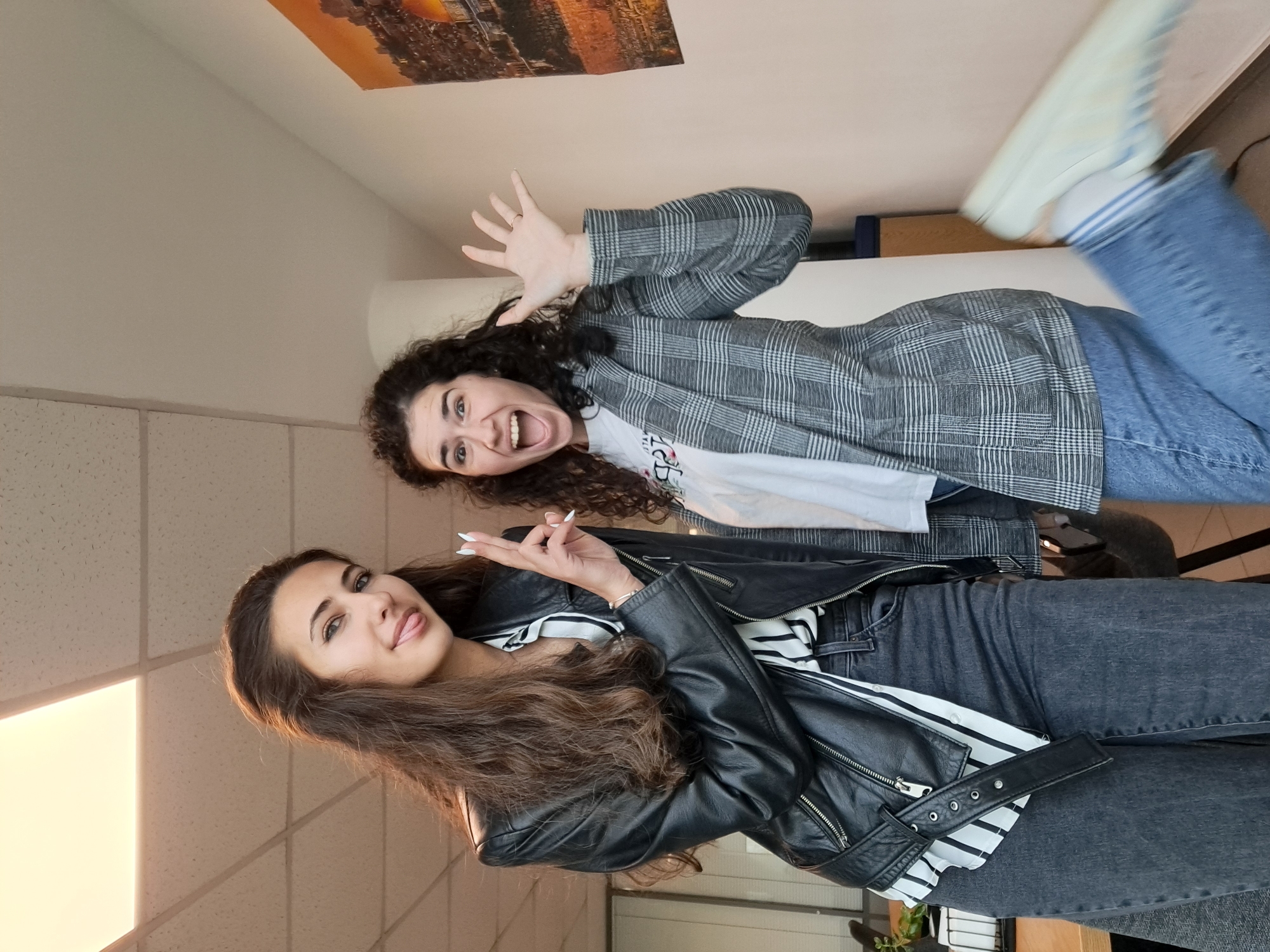 Young women take early morning selfies in Sofia apartment