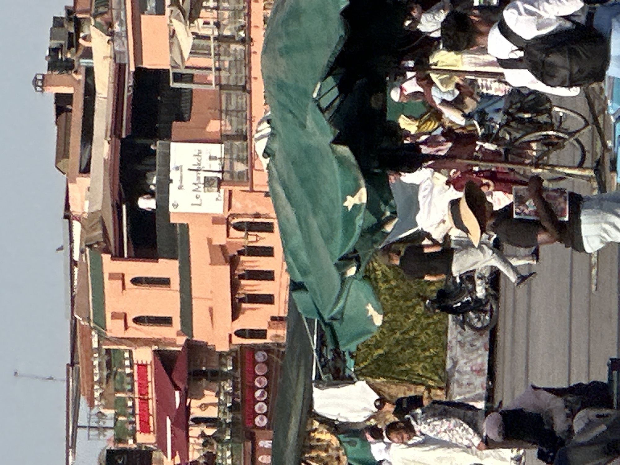 Traditional life documented in Marrakesh public square