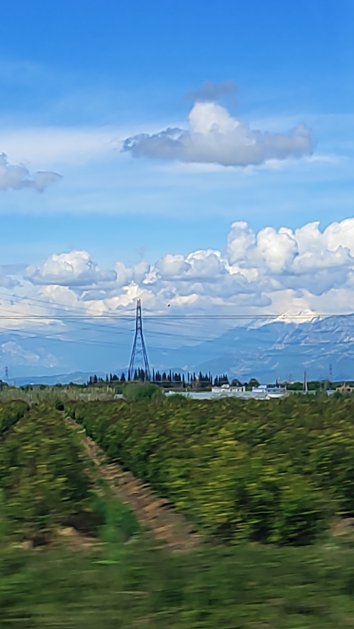Electric transmission tower photographed in Serik, Turkey landscape