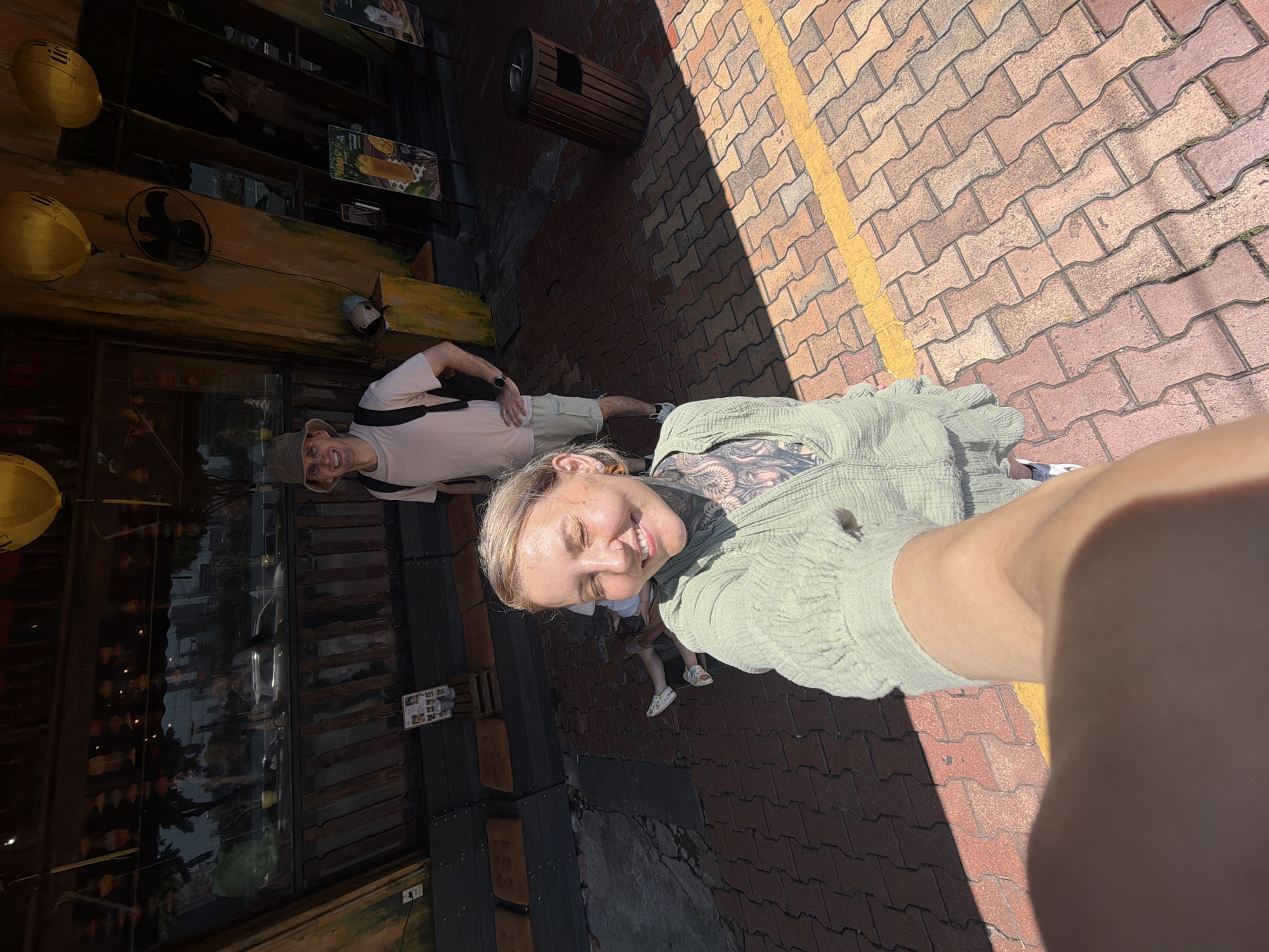 Woman takes selfie outdoors in Đà Nẵng, Vietnam