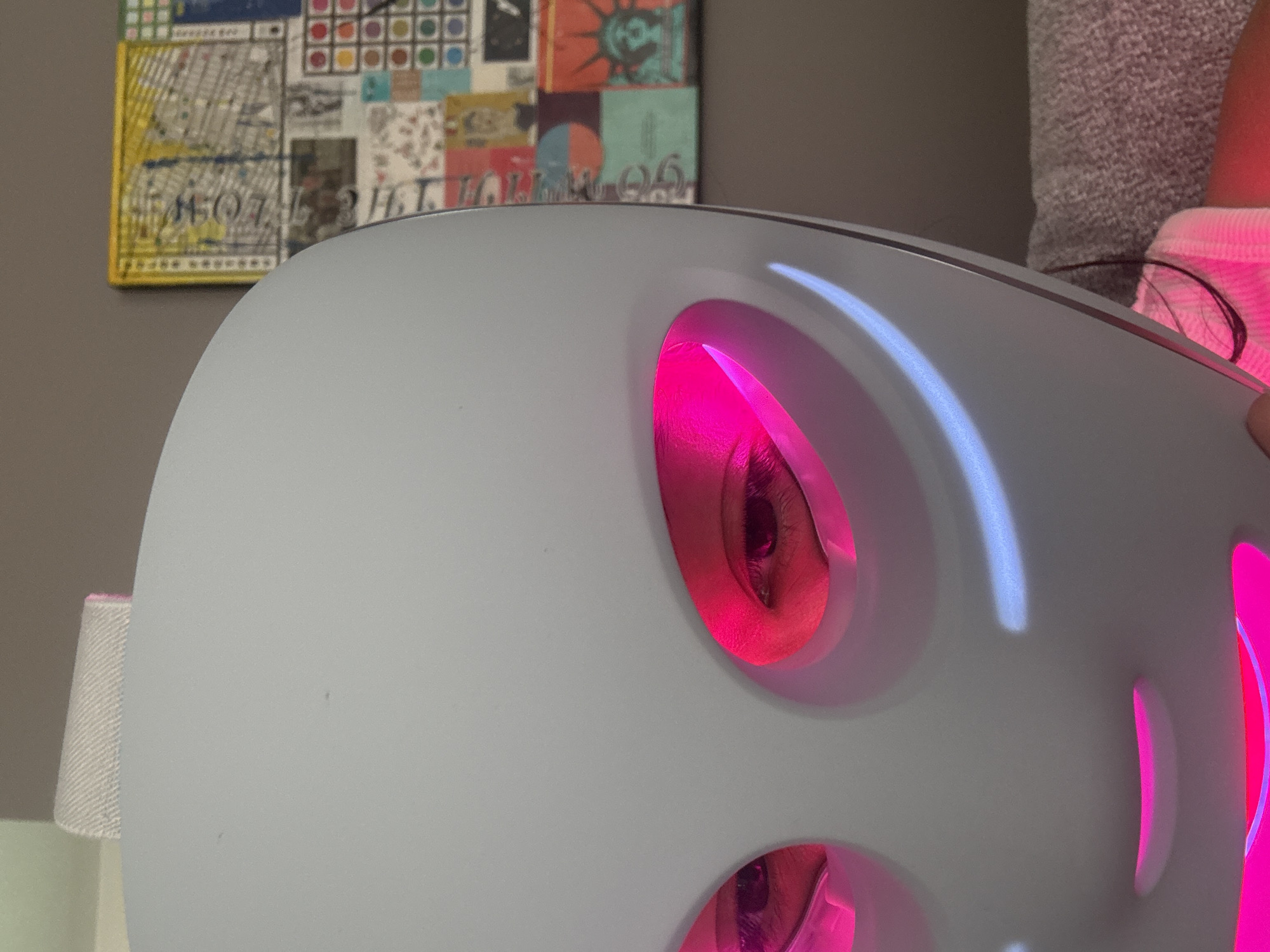 Person uses LED light therapy facial mask in Mexico