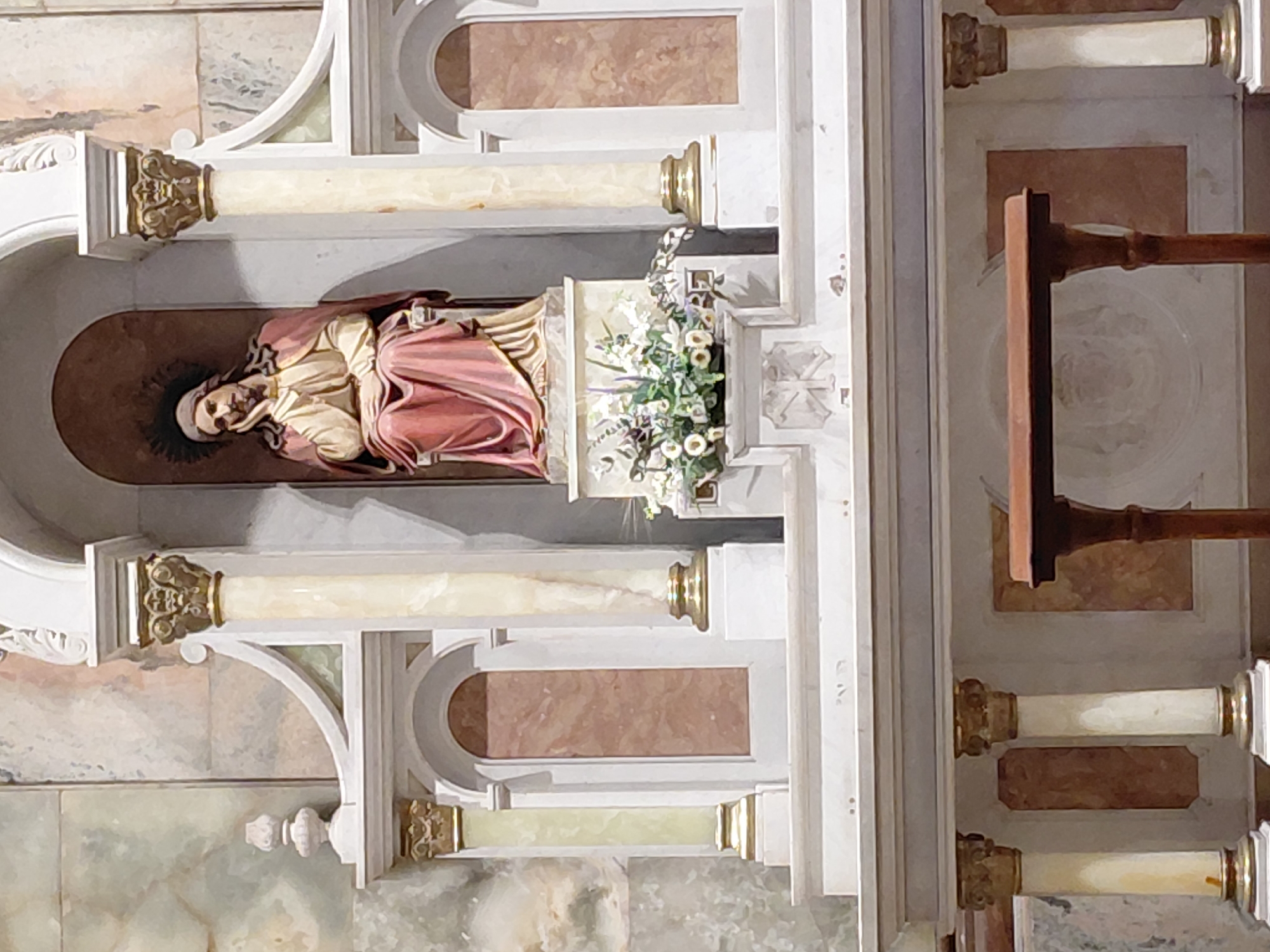 Church interior with gilded altarpiece documented in Mendoza