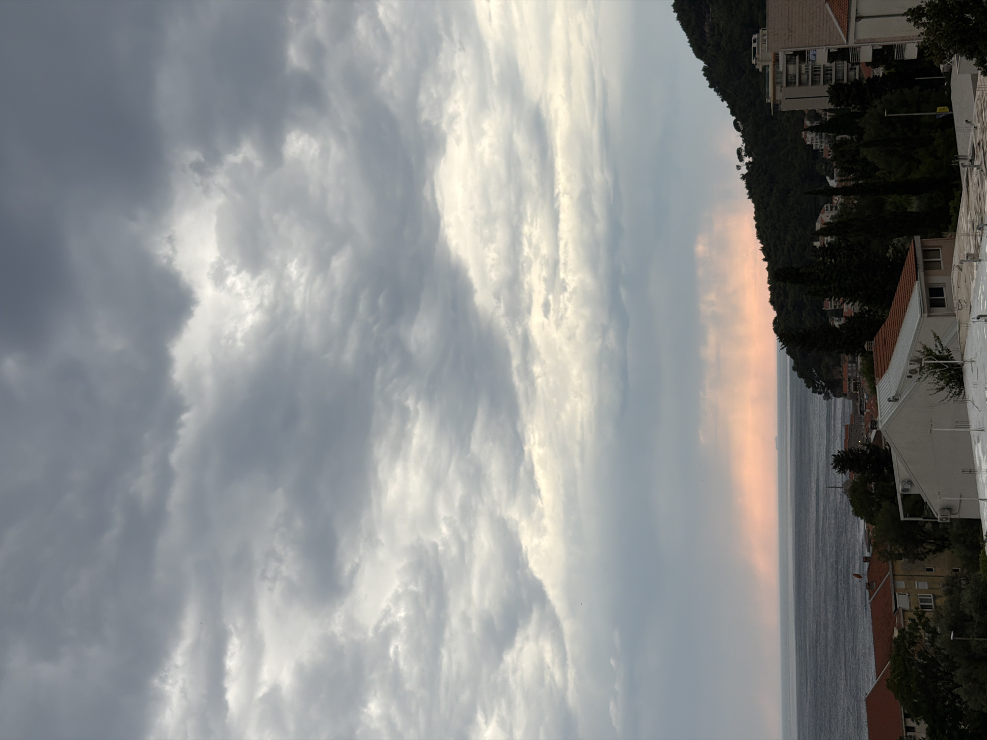 Storm clouds gather over Petrovac na Moru's Adriatic coastline