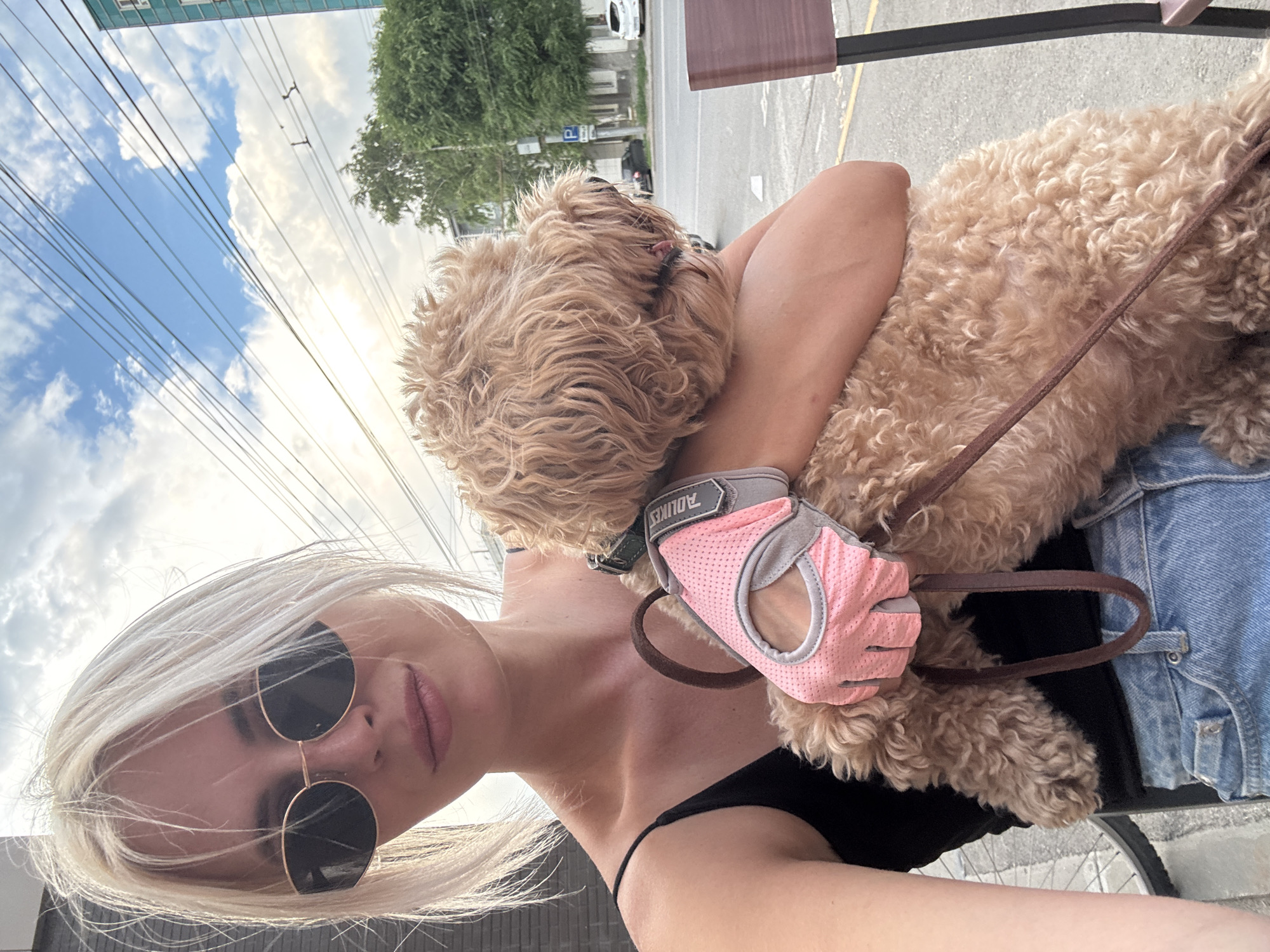 Selfie session with a curly-haired dog in Saratov
