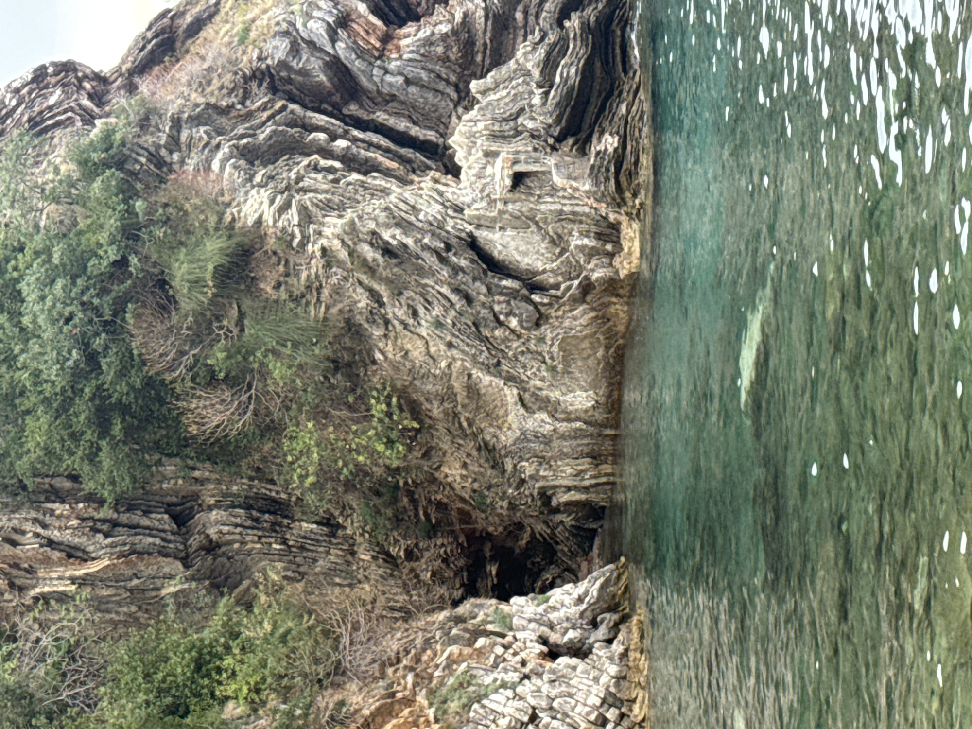 Rocky caves, clear coves, and coastline around Rafailovići, Montenegro